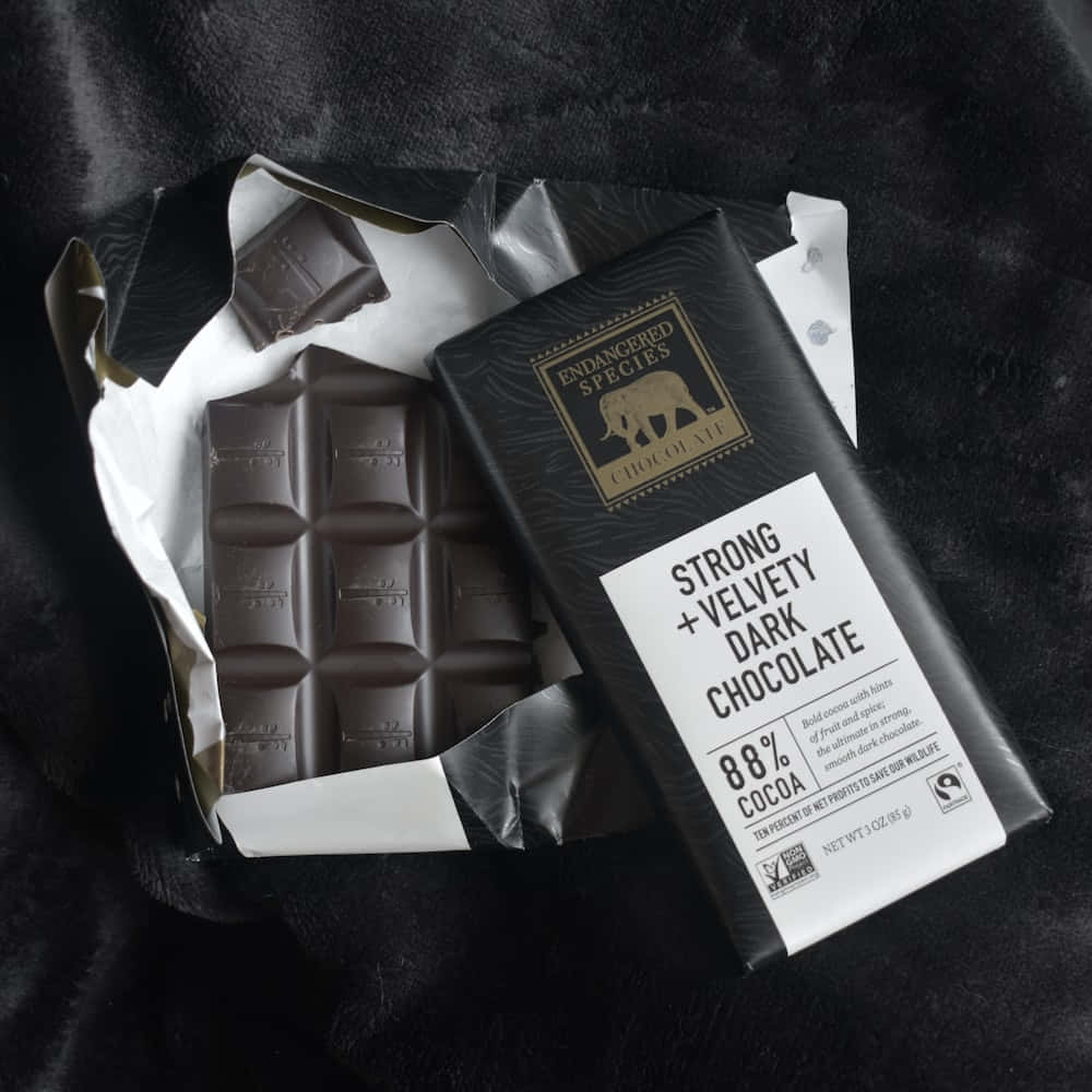 88% dark chocolate bar, plush black fabric, rich texture, SD Desktop Wallpaper