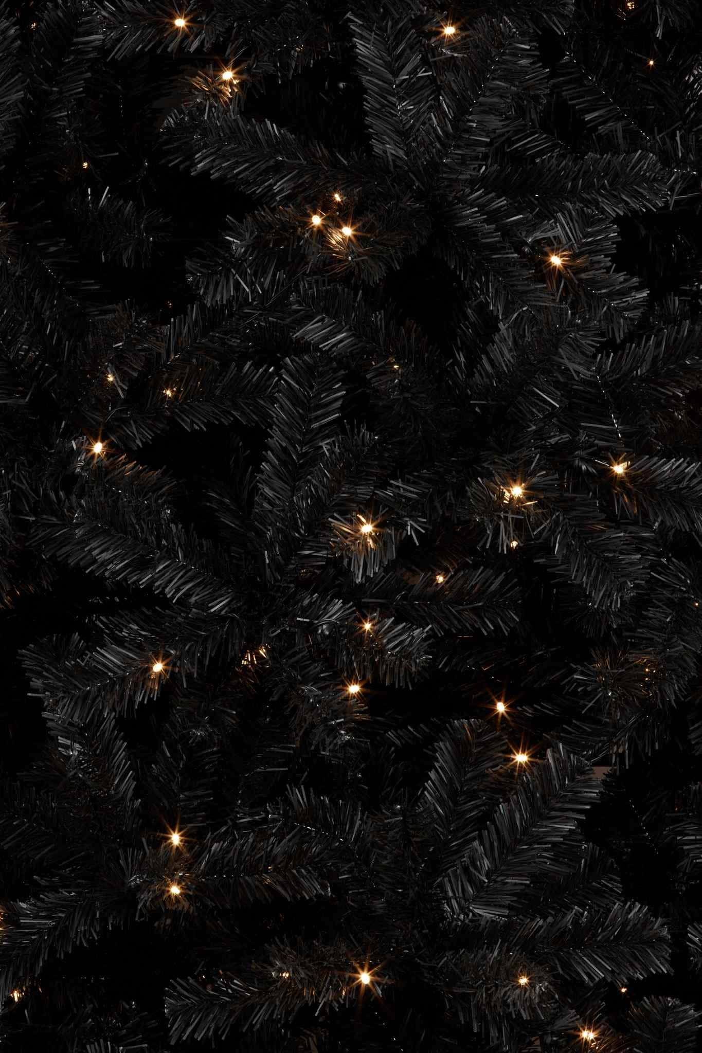 black artificial Christmas tree, warm golden fairy lights, dark background, Full HD Phone Wallpaper