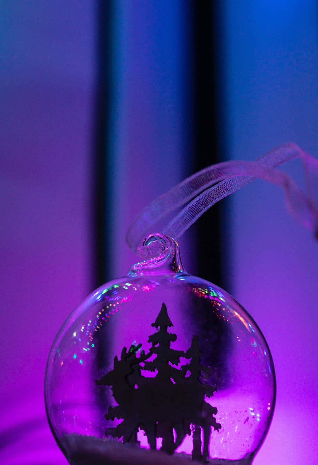 glass snow globe ornament, black silhouette of pine trees, purple and blue neon light, Full HD Phone Wallpaper