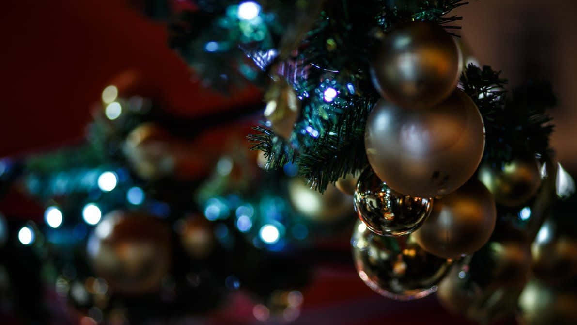 Dark Christmas, shimmering gold ornaments, teal lights, SD Desktop Wallpaper