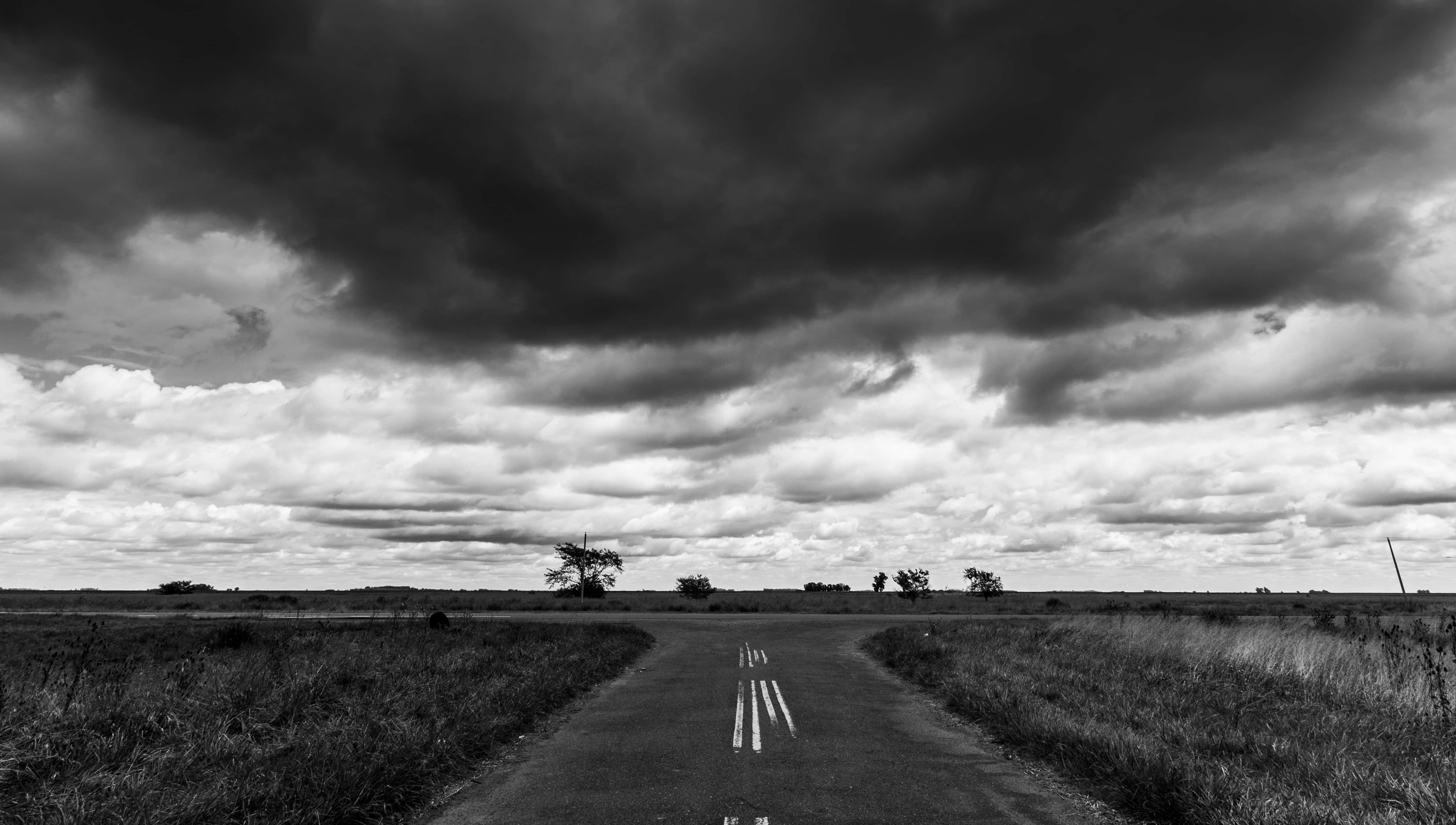 Dark Crossroad, monochrome sky, heavy clouds, 4K Desktop Wallpaper