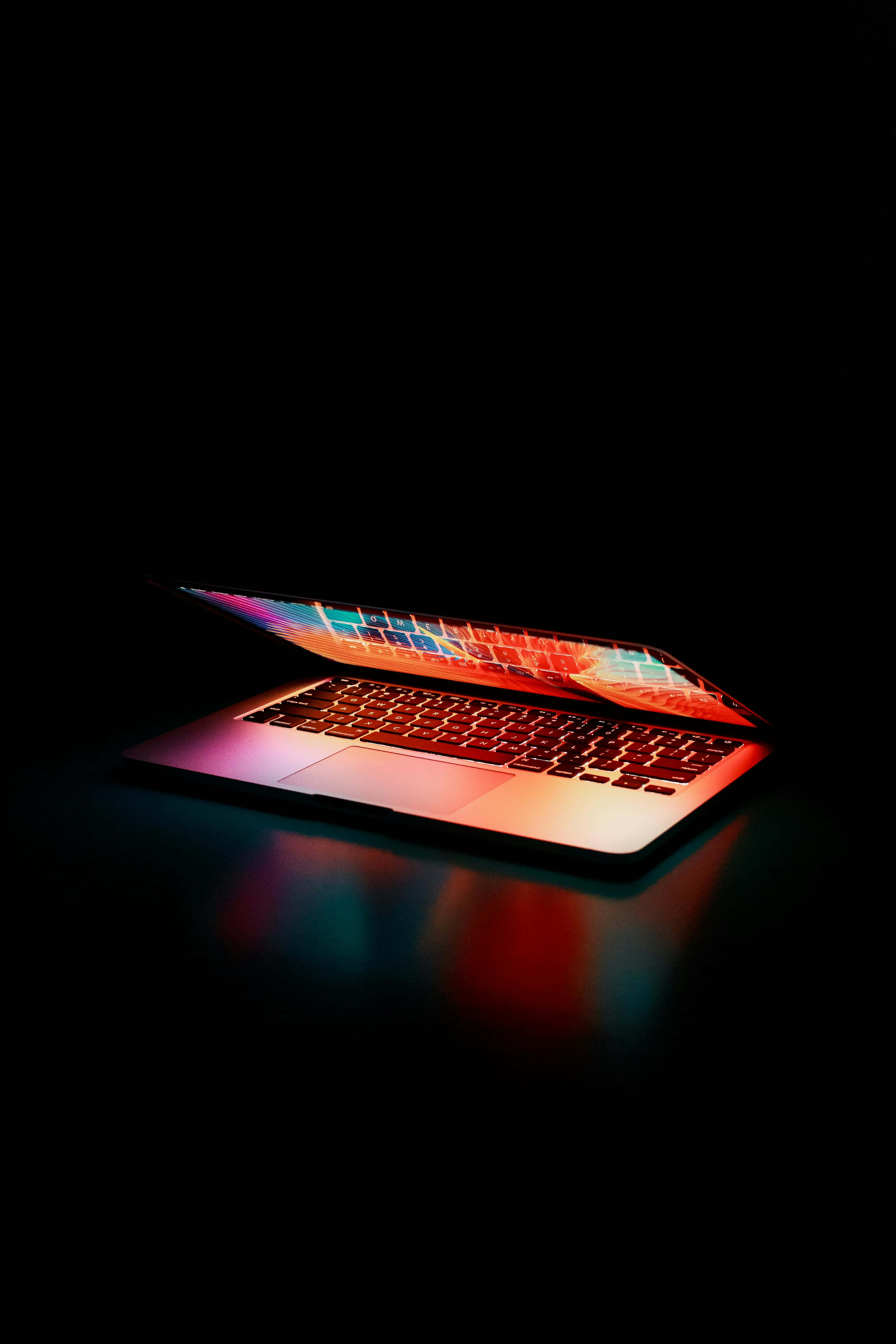 neon colors, pitch-black background, laptop, 5K Phone Wallpaper