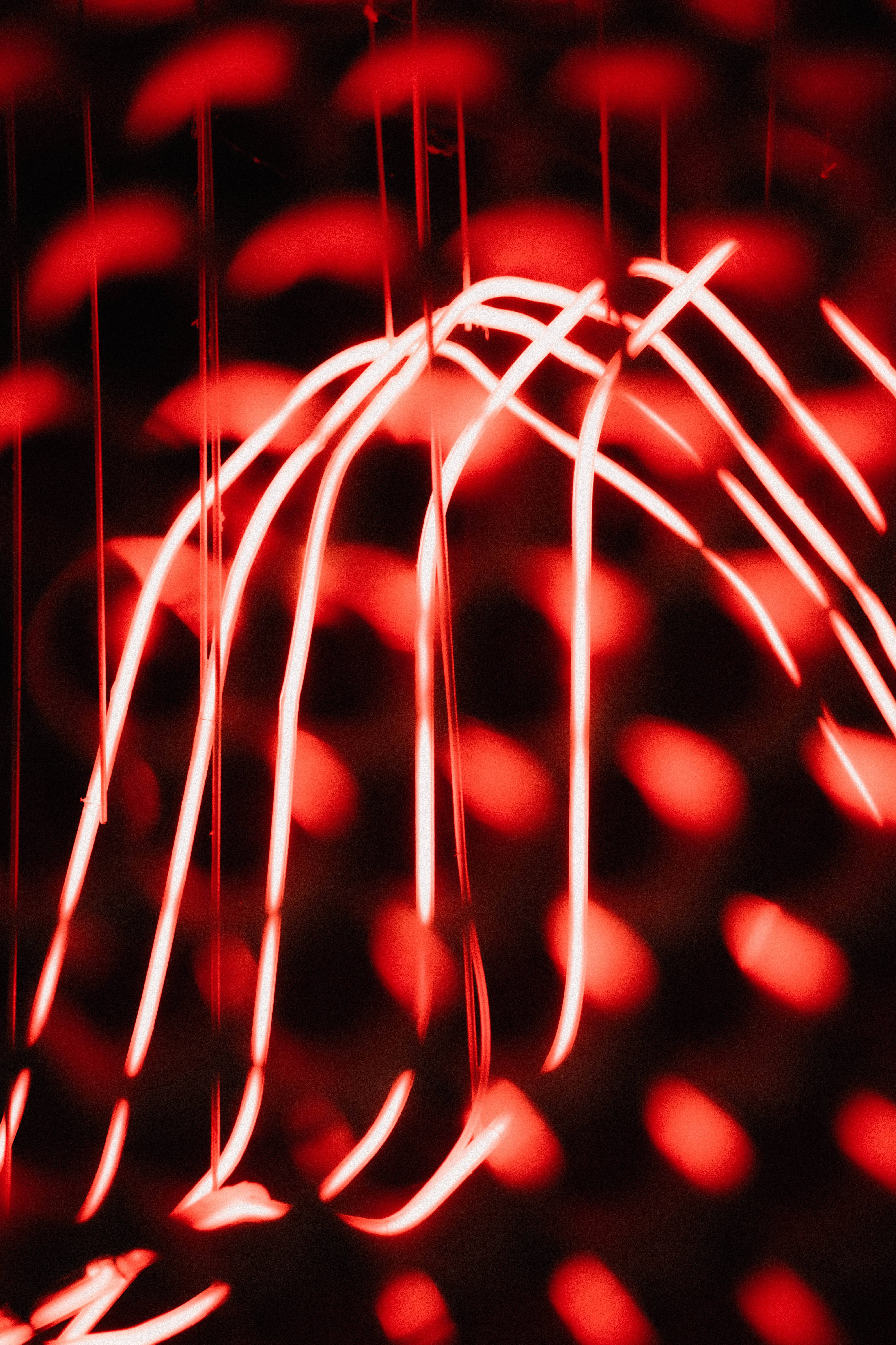 red glowing lights, neon lights, dark background, 5K Phone Wallpaper