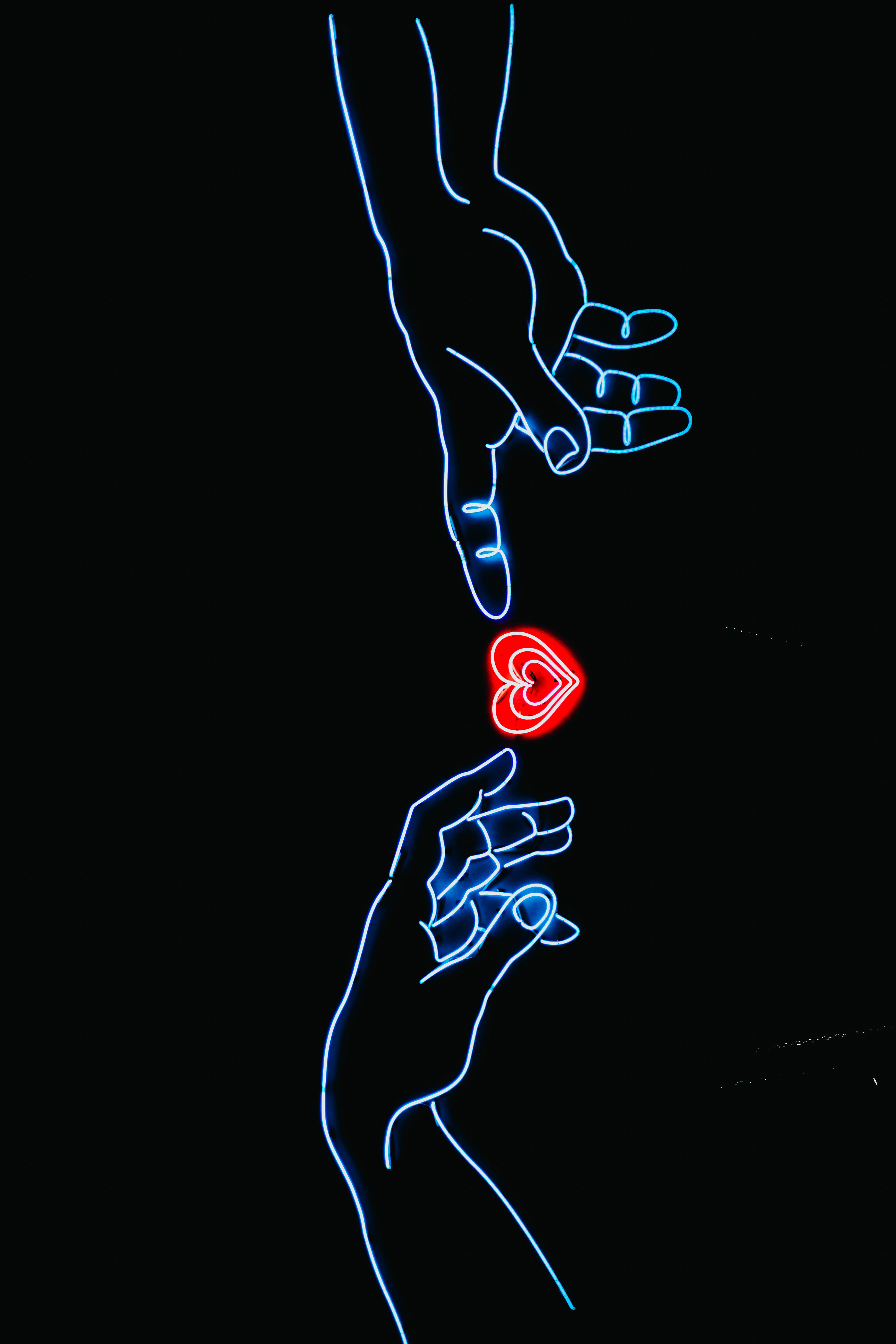 Dark Heart, glowing blue hands, vibrant red heart-shaped light, 5K Phone Wallpaper