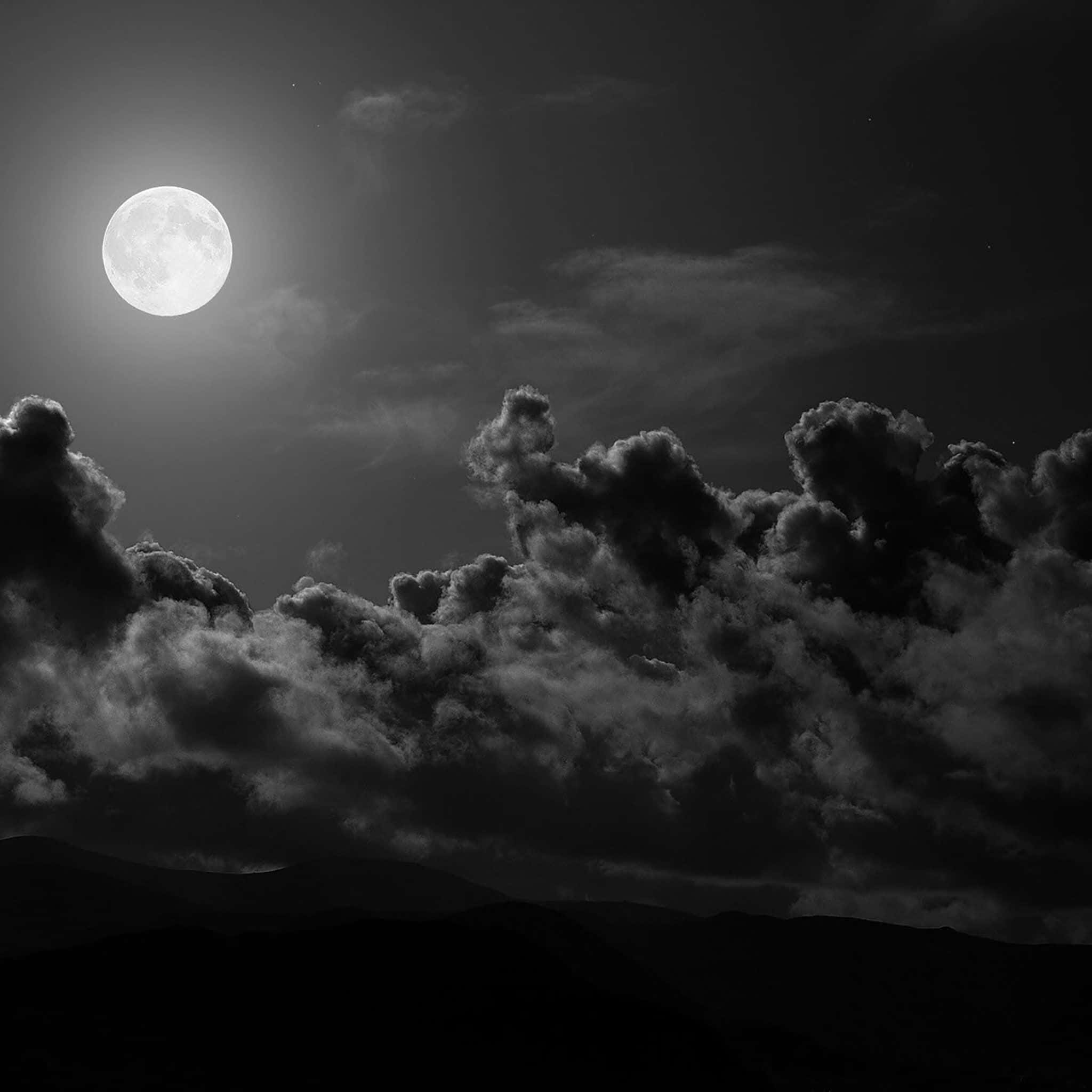 Dark iPad, luminous full moon, dramatic clouds, Full HD Desktop Wallpaper