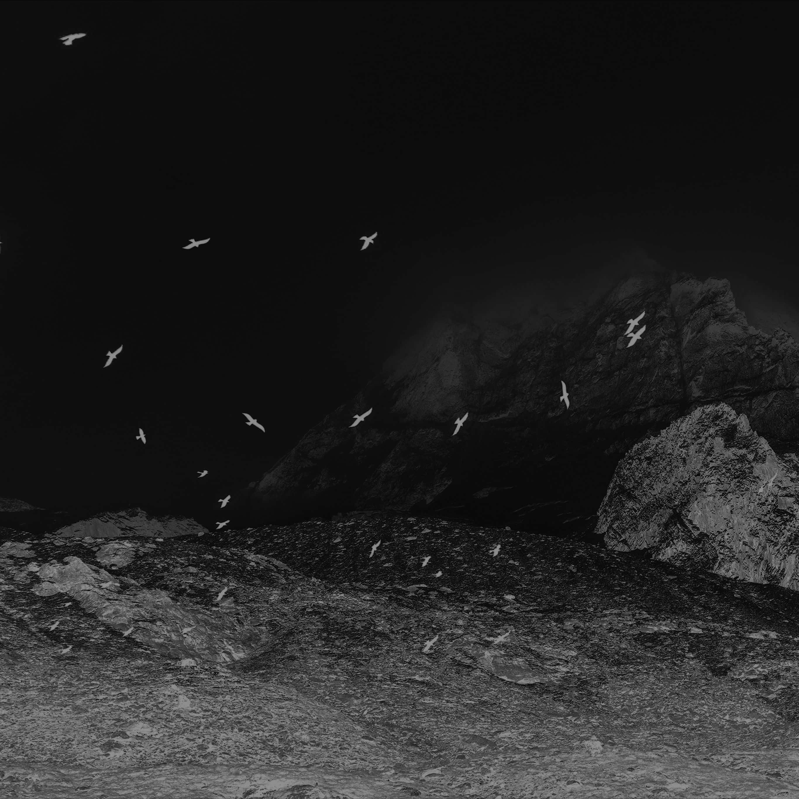 Dark iPad, monochrome mountain range, deep night sky, 2K Desktop Wallpaper