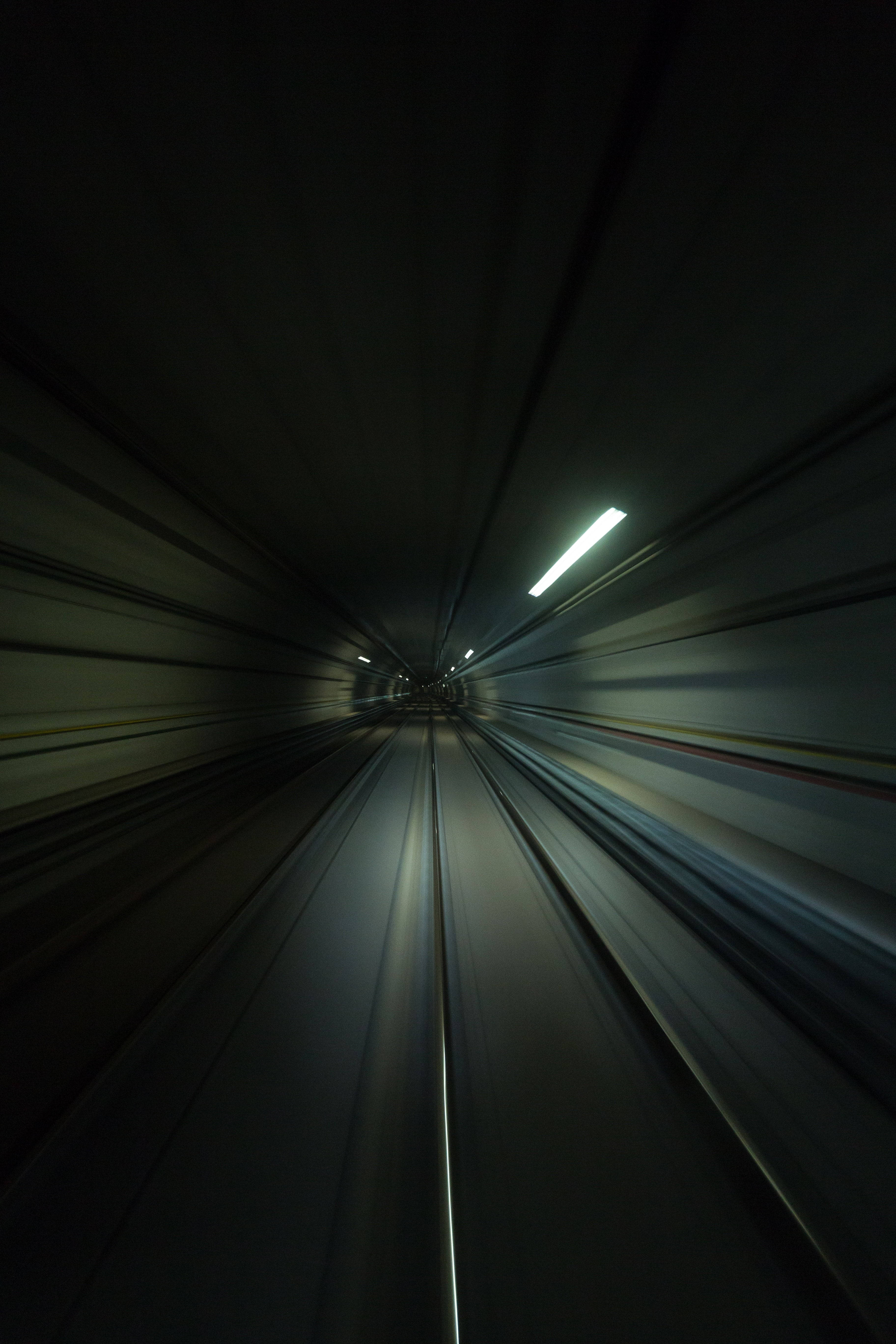 tunnel, high-speed motion blur, streaking lights, 5K Phone Wallpaper