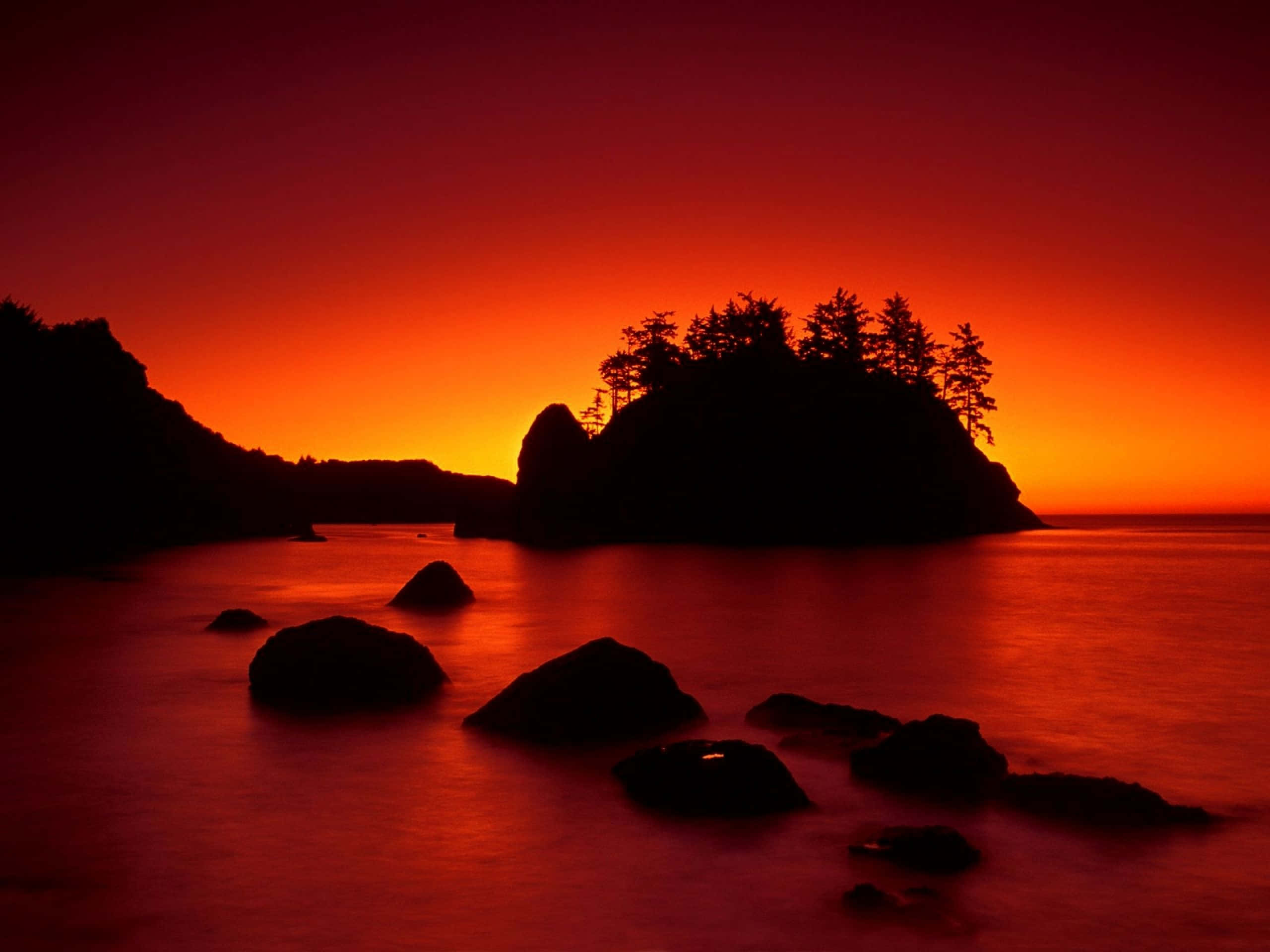 Dark Island, fiery sunset, deep reds and oranges, 2K Desktop Wallpaper