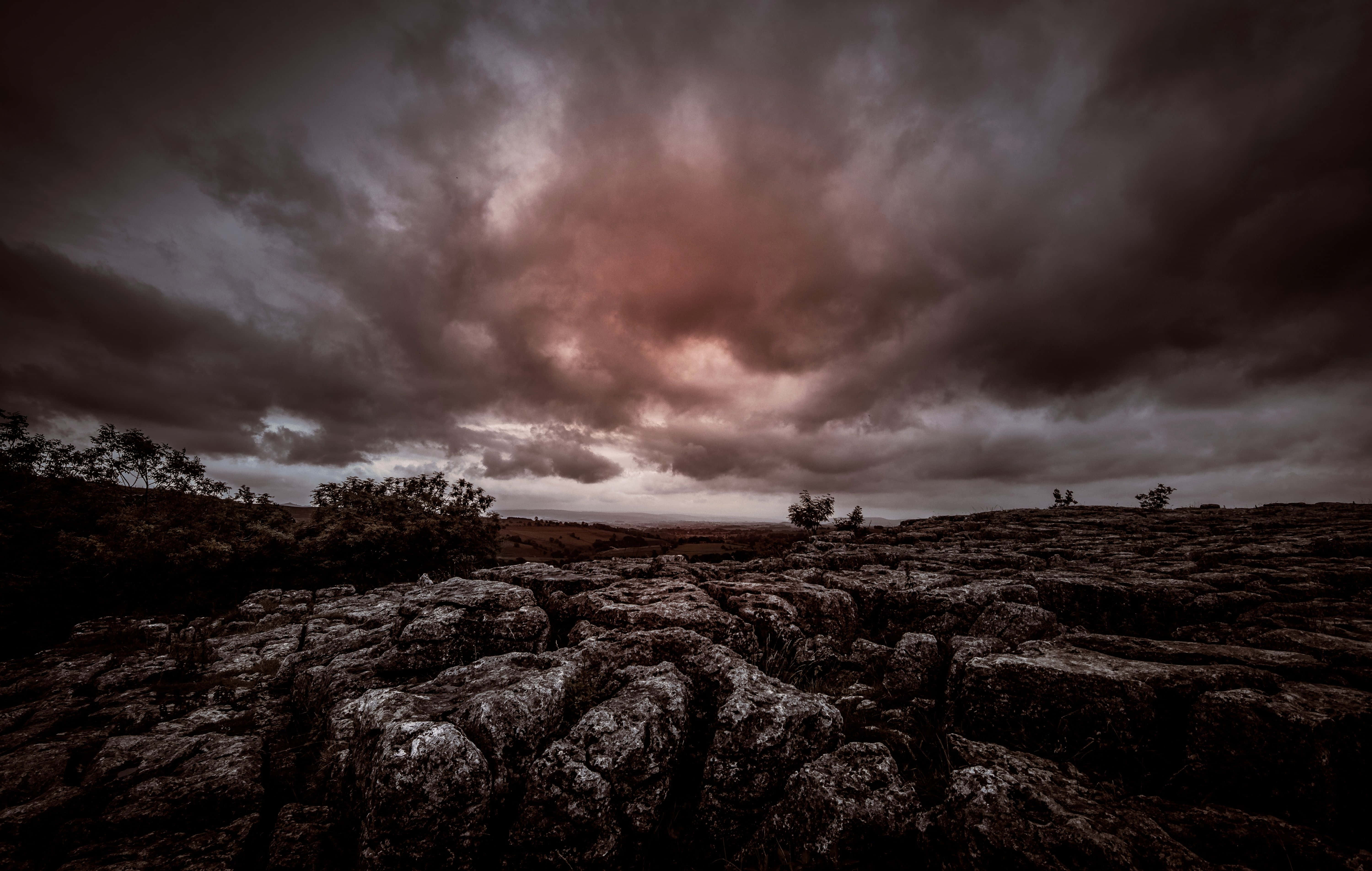 Dark Landscape, cracked limestone pavement, bruised twilight sky, 5K Desktop Wallpaper