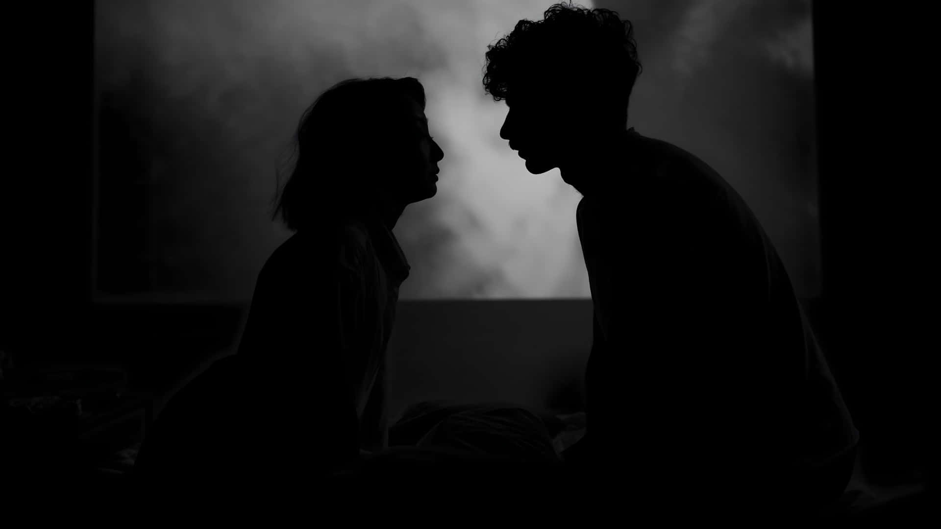 shadowed lovers embrace, silhouetted figures, dimly lit room, Full HD Desktop Wallpaper