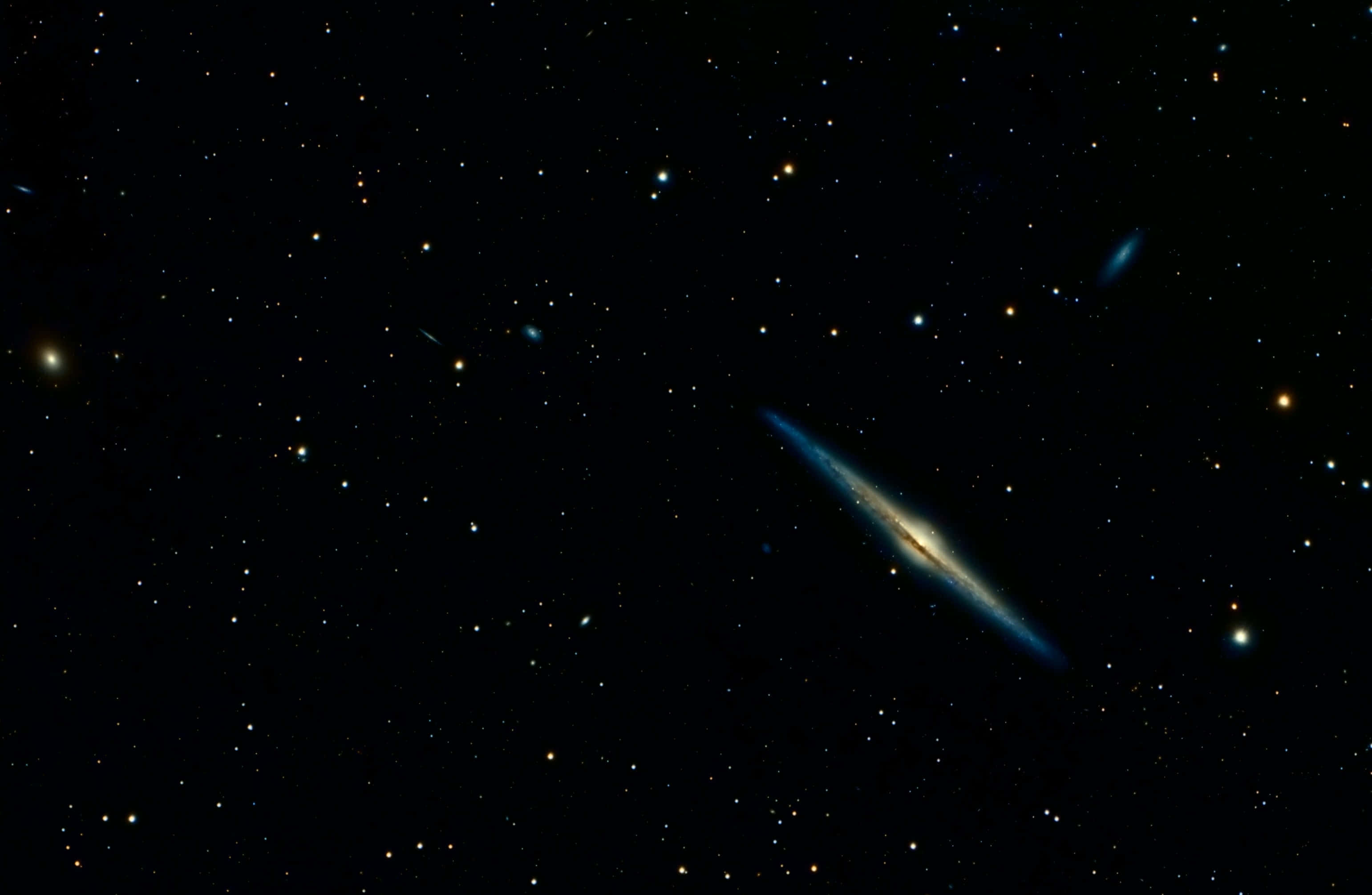 Dark Galaxy 3083, blue and yellow hues, spiral galaxy, 2K Desktop Wallpaper