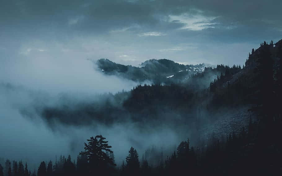 Misty mountains, swirling fog, moody gray sky, SD Desktop Wallpaper