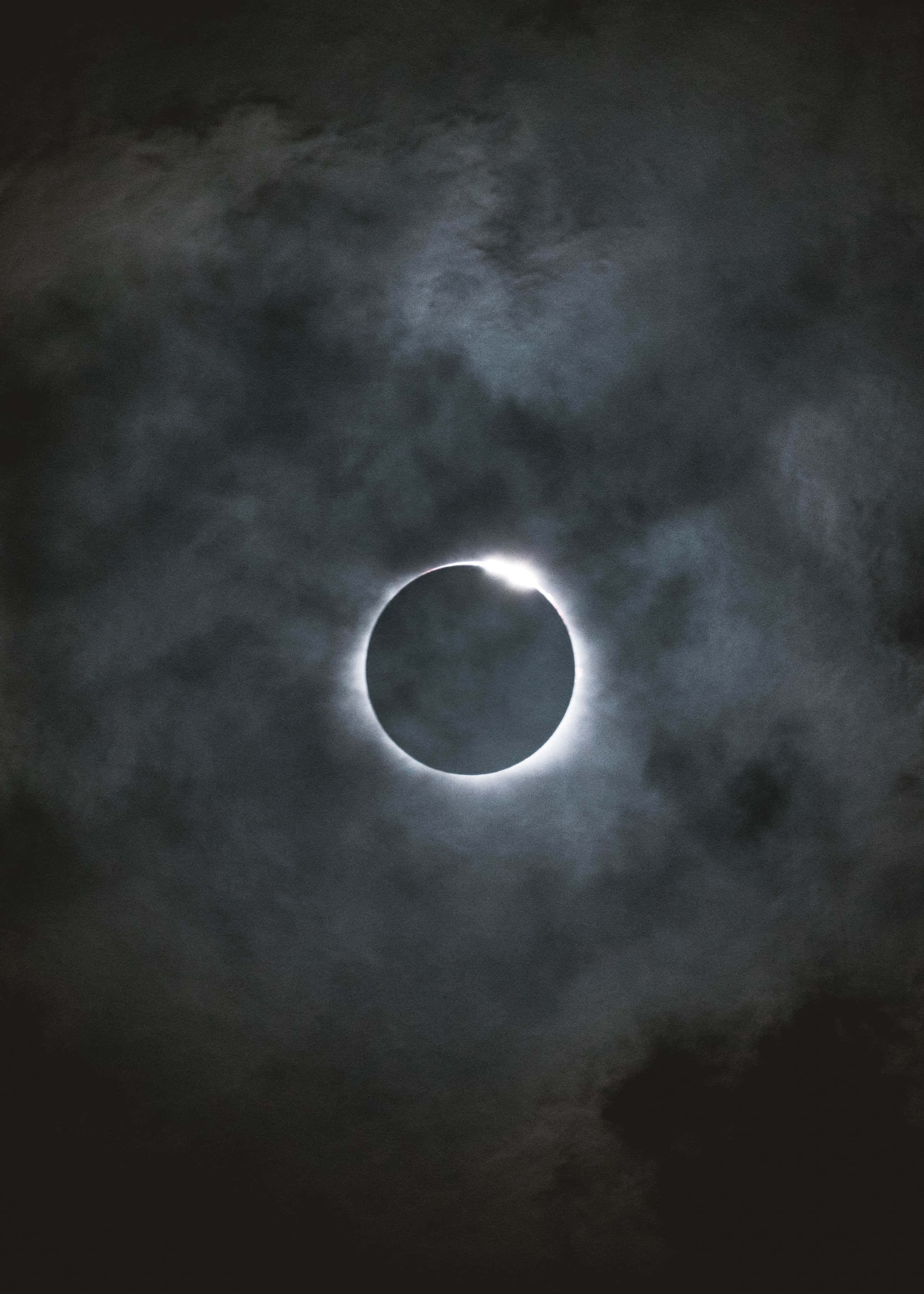 Dark Moon, annular solar eclipse, swirling dark clouds, 2K Phone Wallpaper