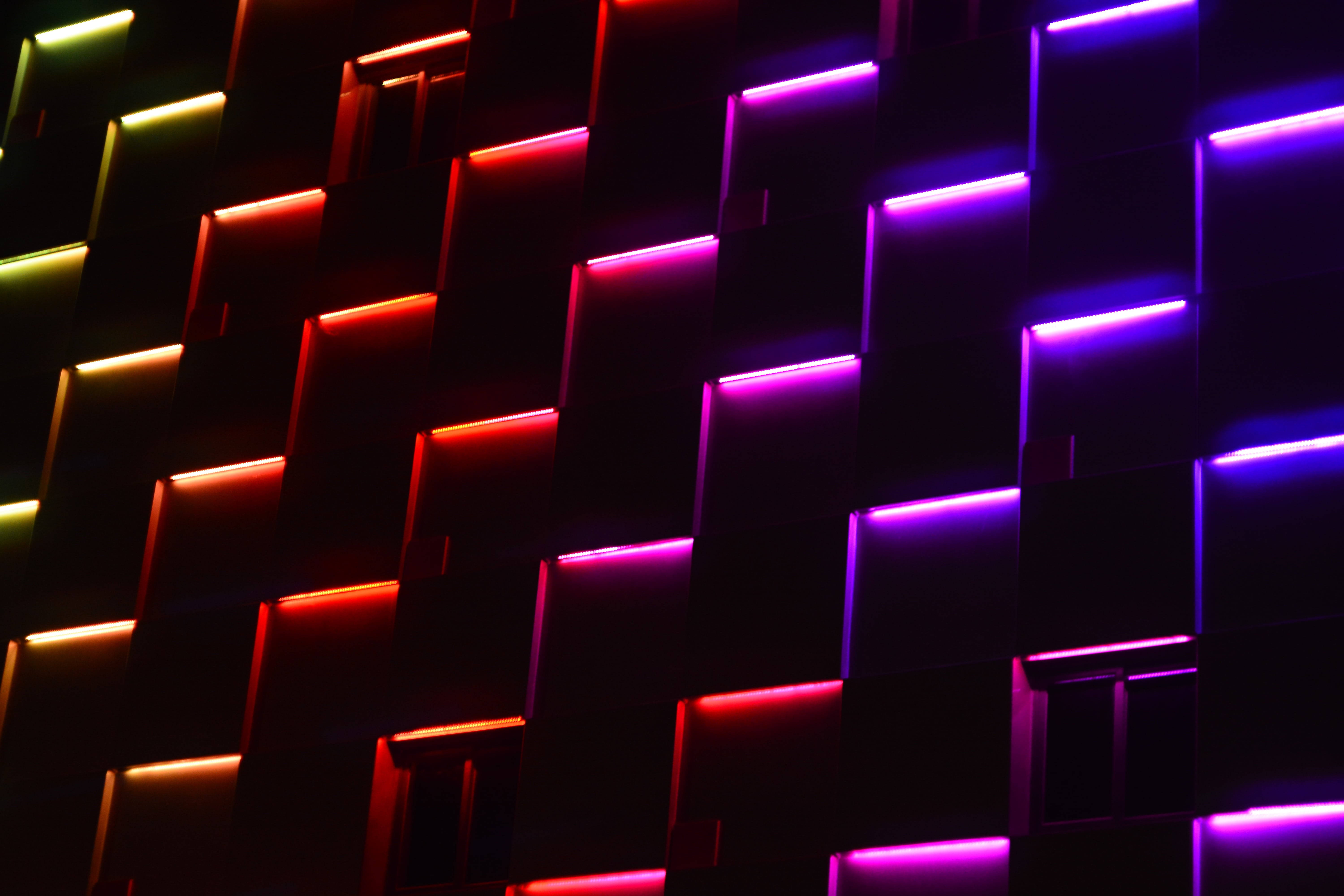 dark wall, glowing neon cubes, red purple and yellow, 5K Desktop Wallpaper