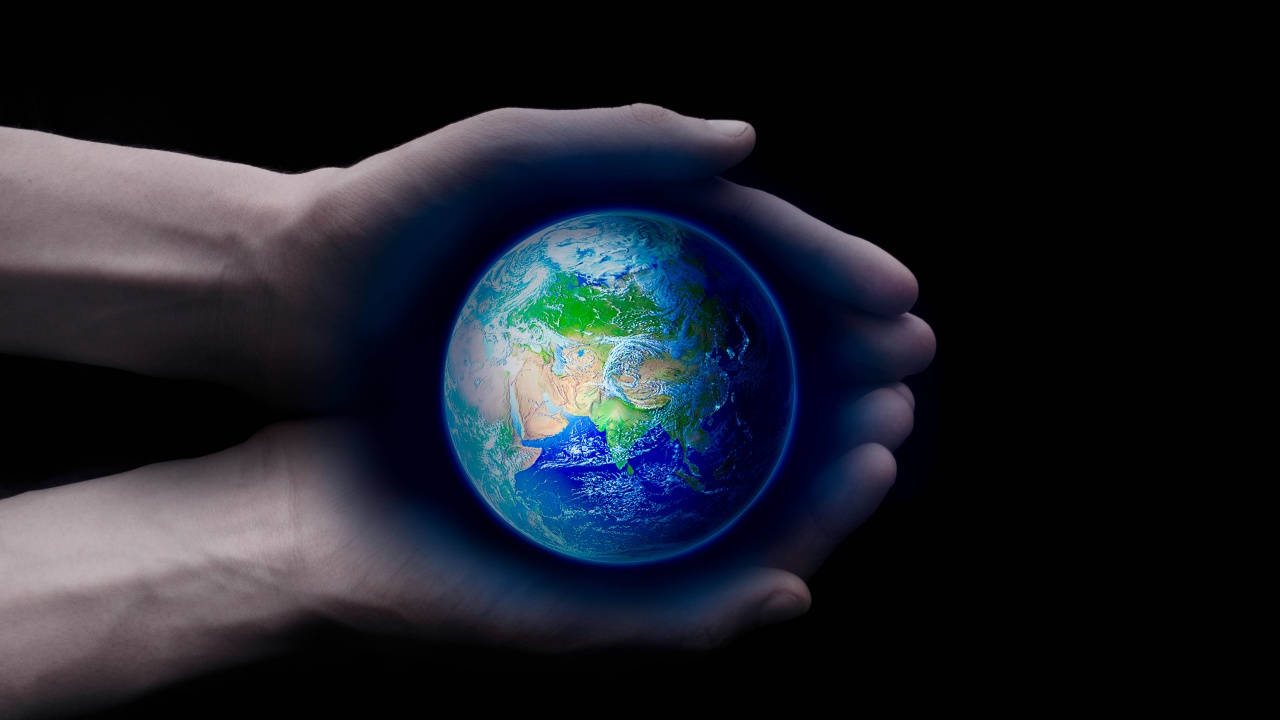 Dark Earth PC, glowing blue-green Earth, stark black background, HD Desktop Wallpaper