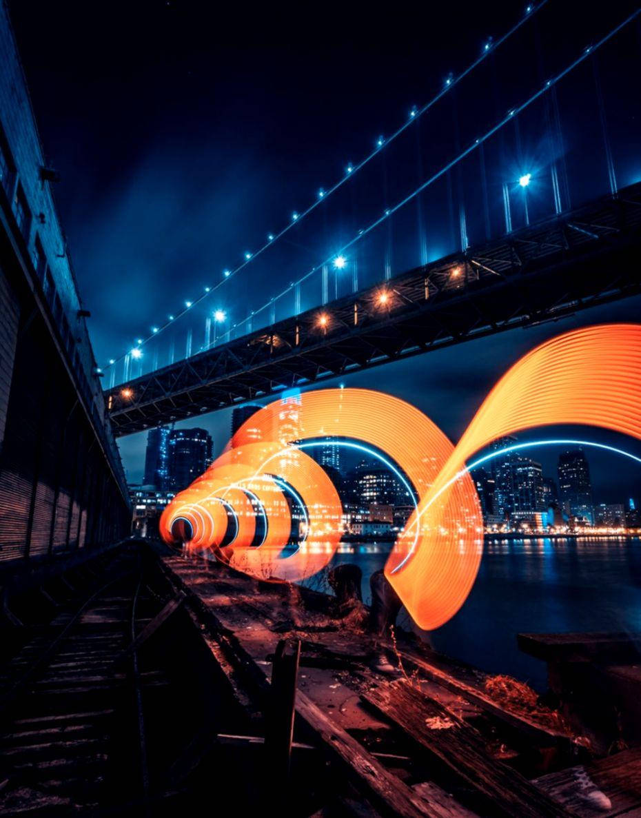 Dark Phone, orange light, glowing blue bridge, SD Phone Wallpaper