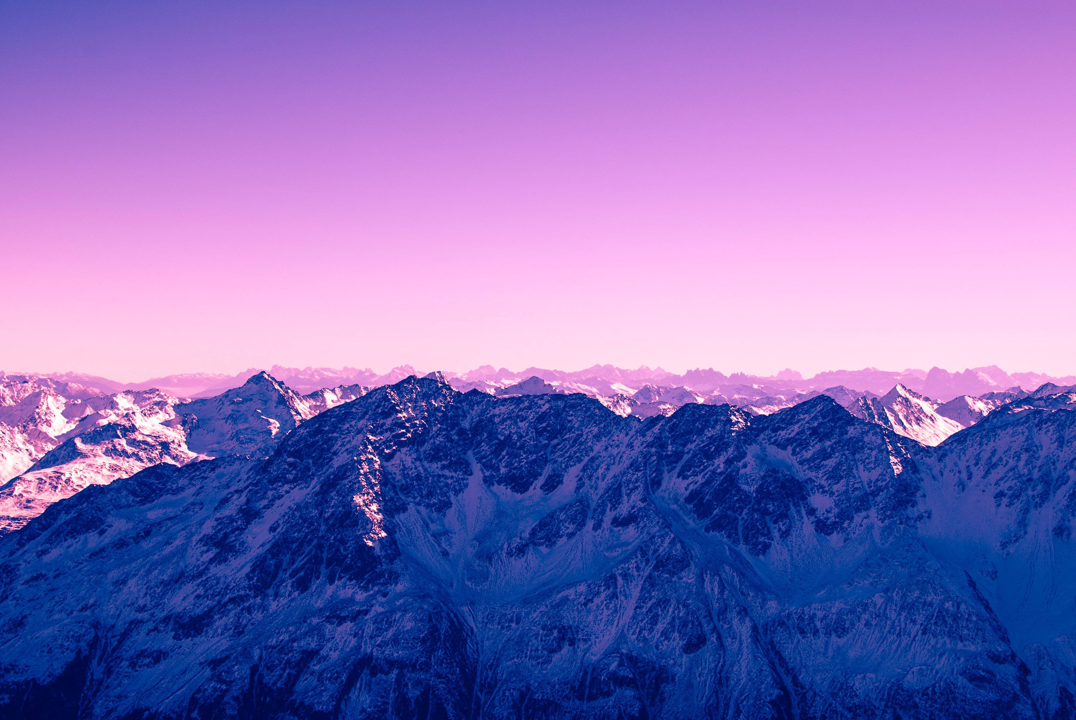 mountain range, snowcapped mountain peaks, purple twilight sky, 2K Desktop Wallpaper