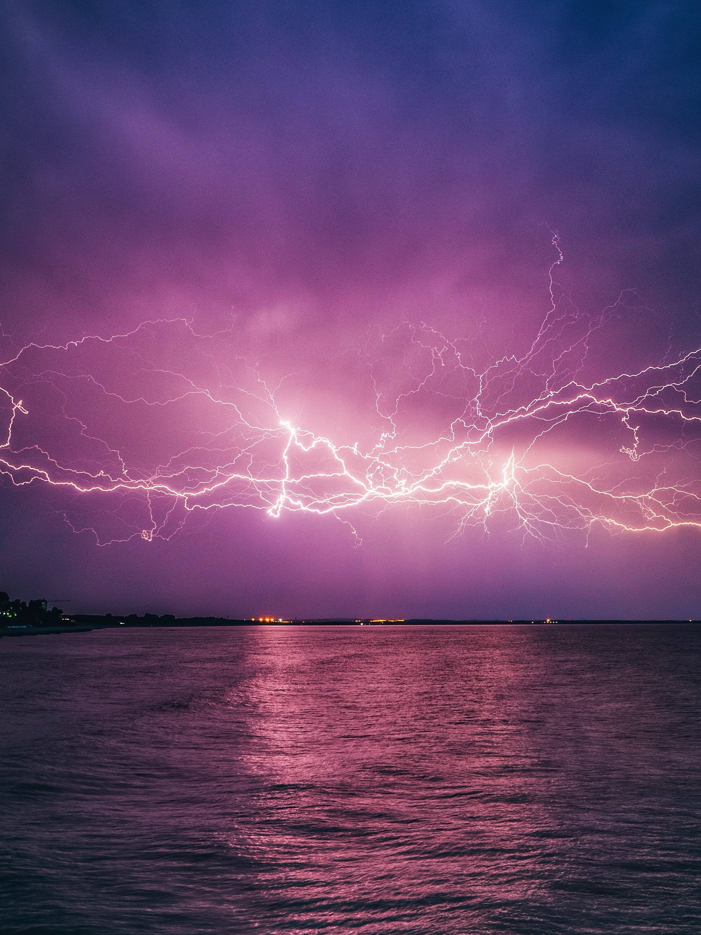 Lightning Dark Purple iPhone, purple lightning storm, calm body of water, 2K Phone Wallpaper