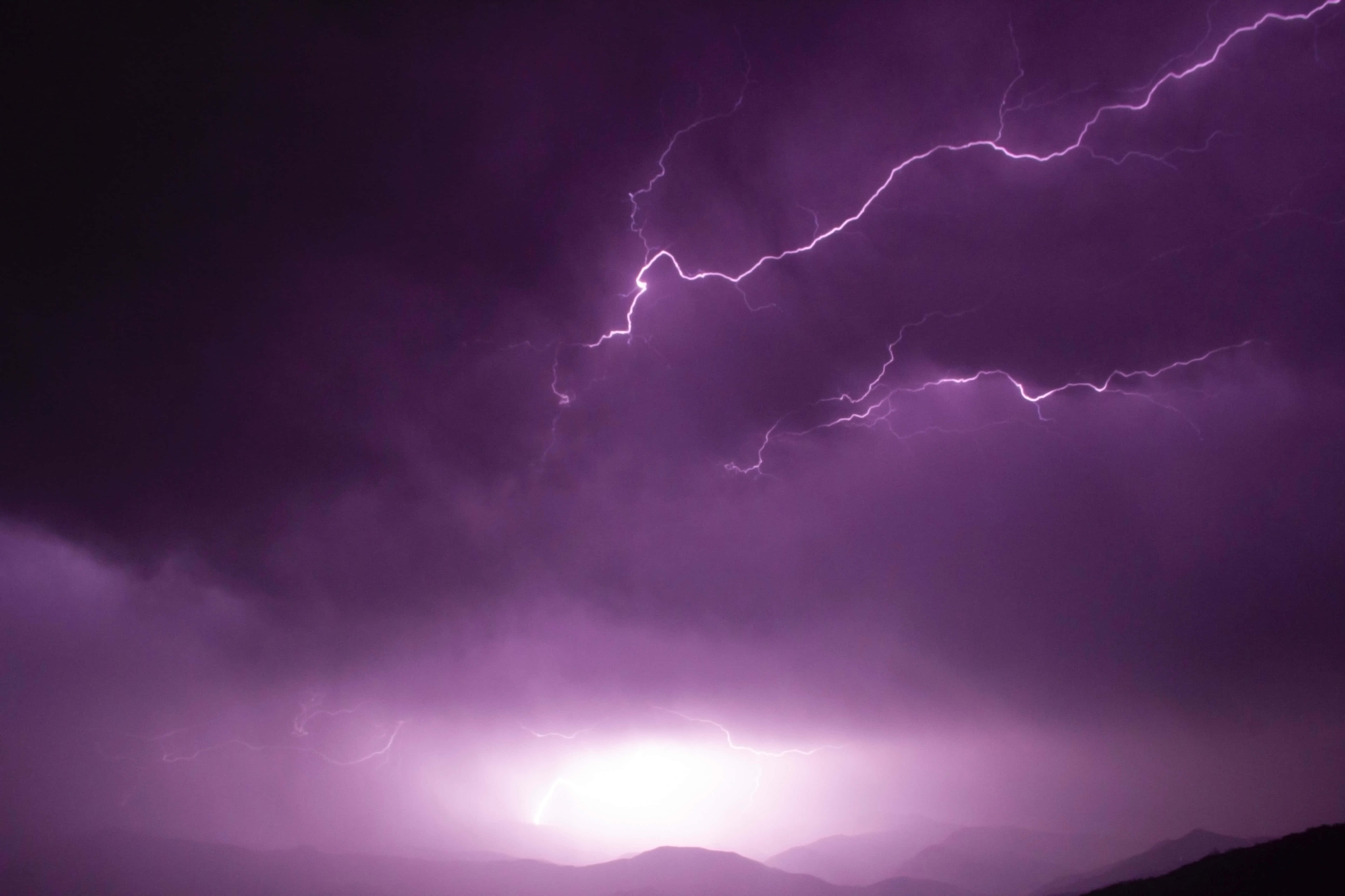 purple lightning, stormy sky, silhouetted mountains, 5K Desktop Wallpaper