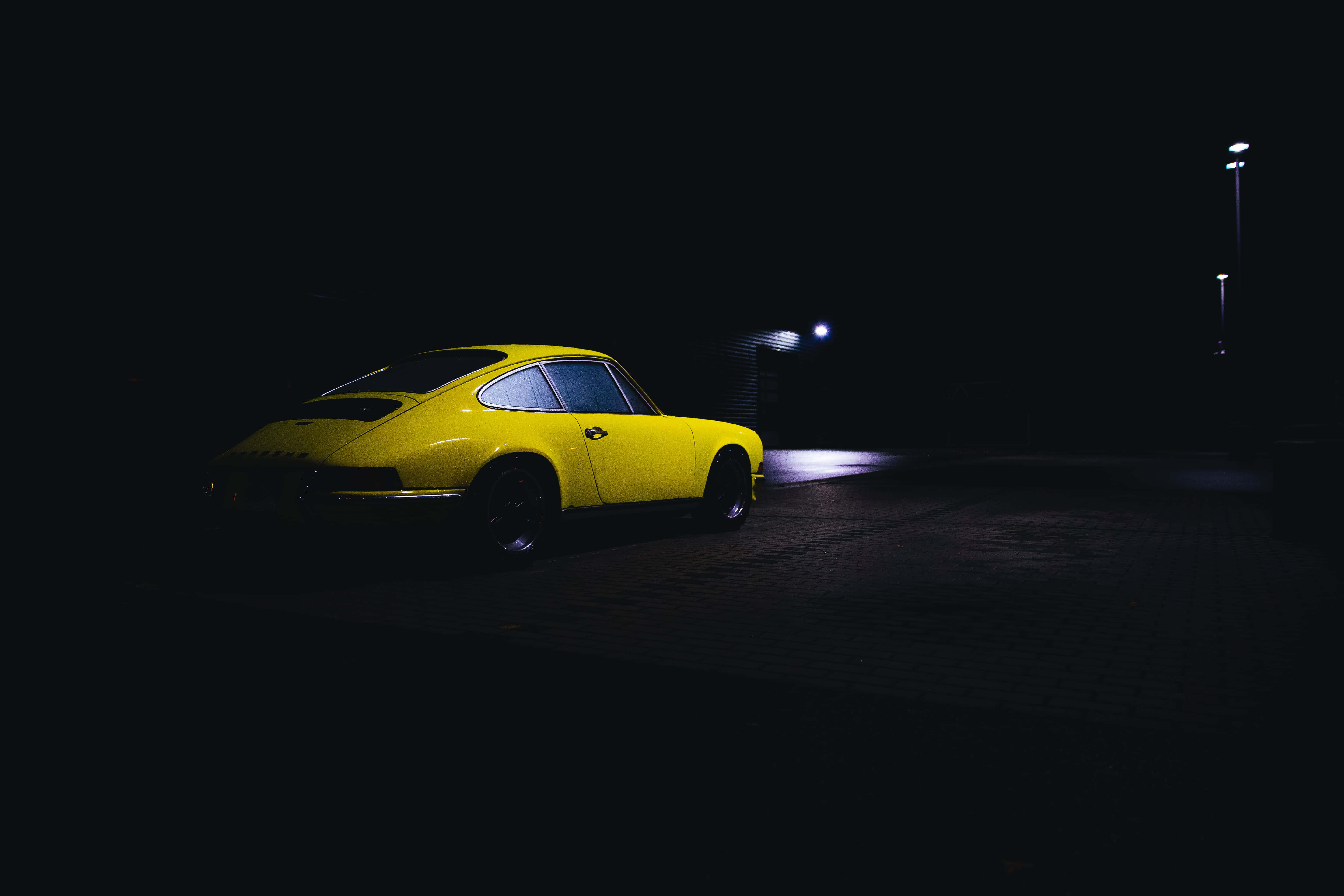 Retro Dark Styled Bar, vibrant yellow, classic sports car, 5K Desktop Wallpaper