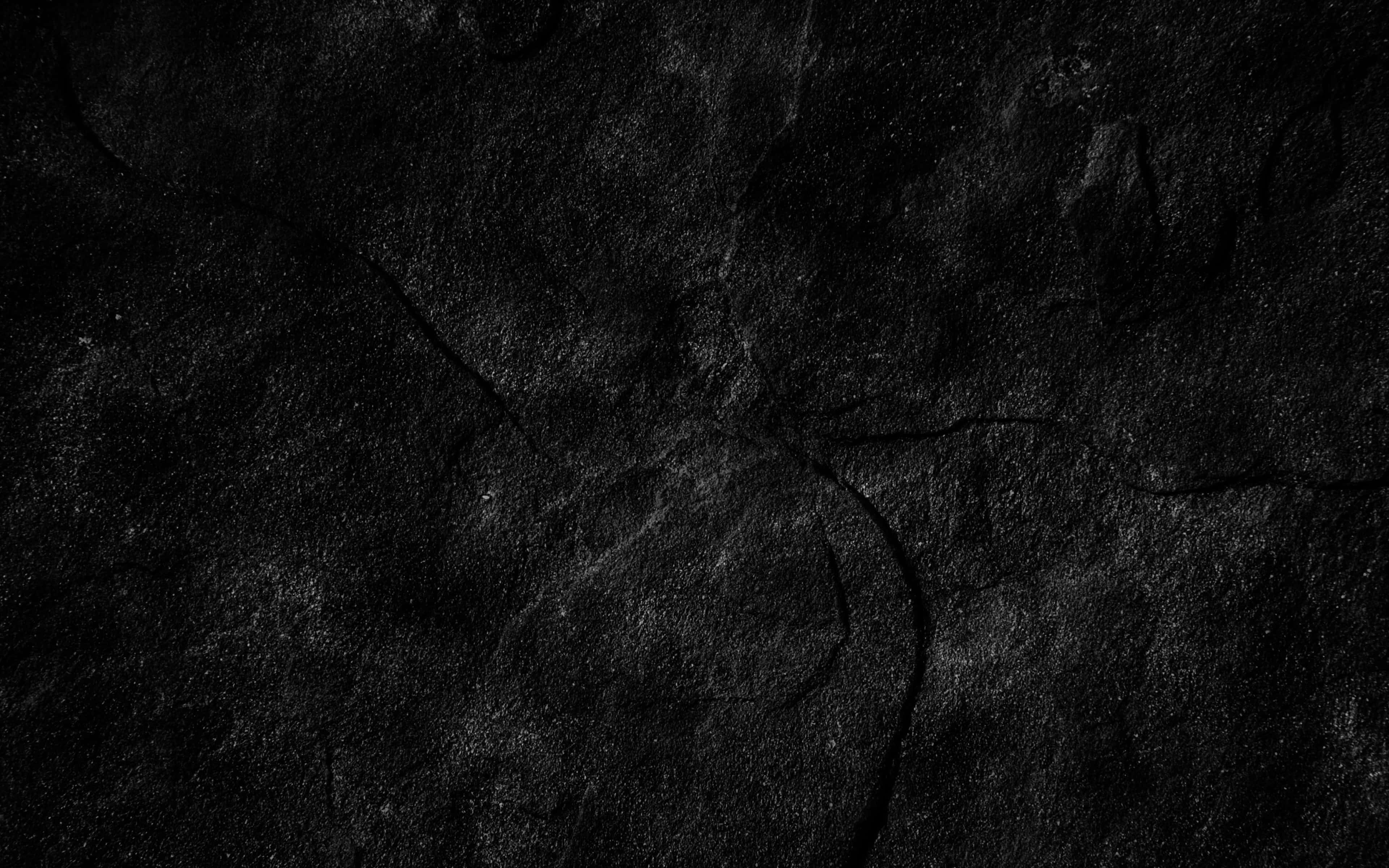 Dark Rock, dark cracked concrete surface, subtle texture, 4K Desktop Wallpaper