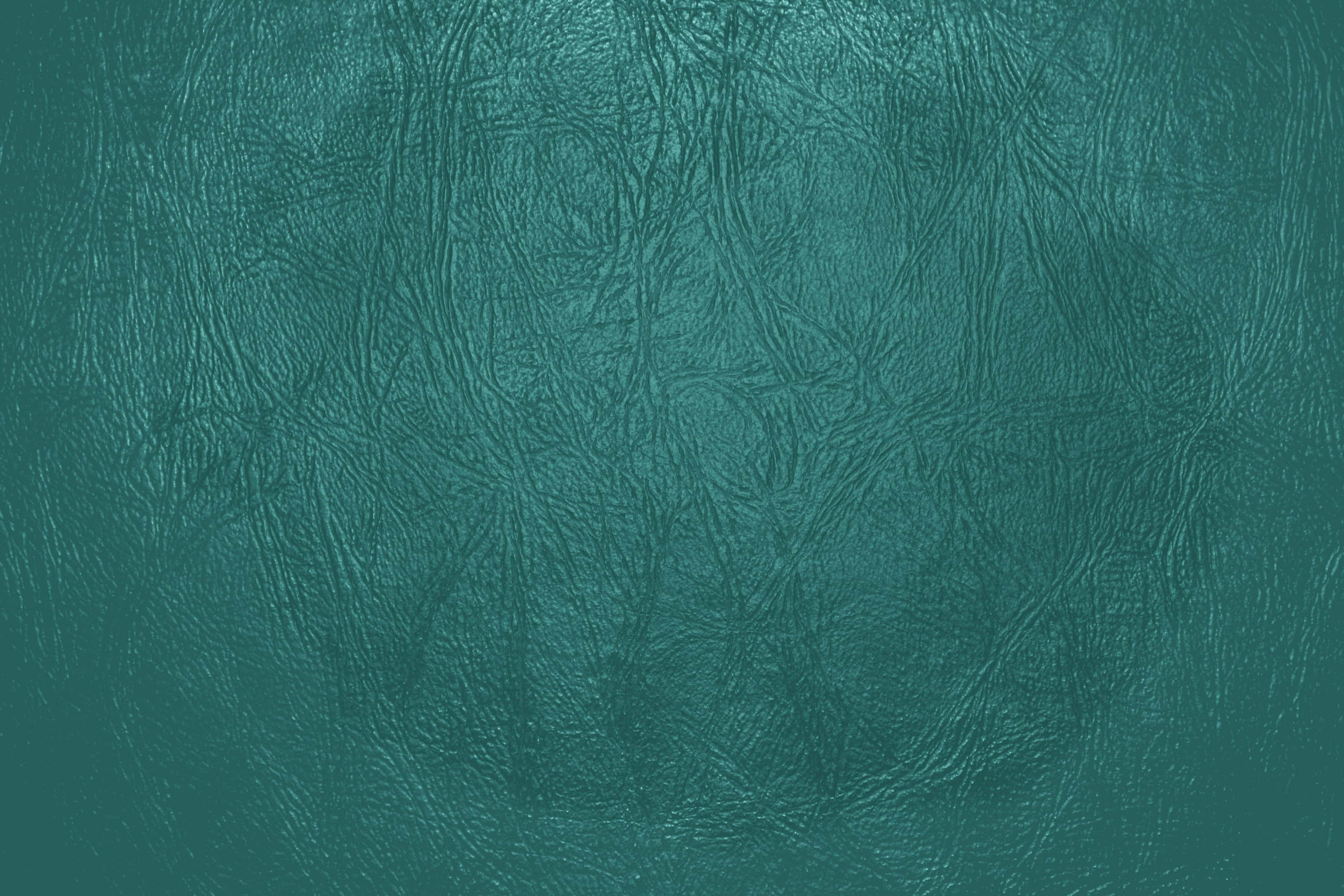 Dark Teal, textured teal leather, natural creases, 2K Desktop Wallpaper