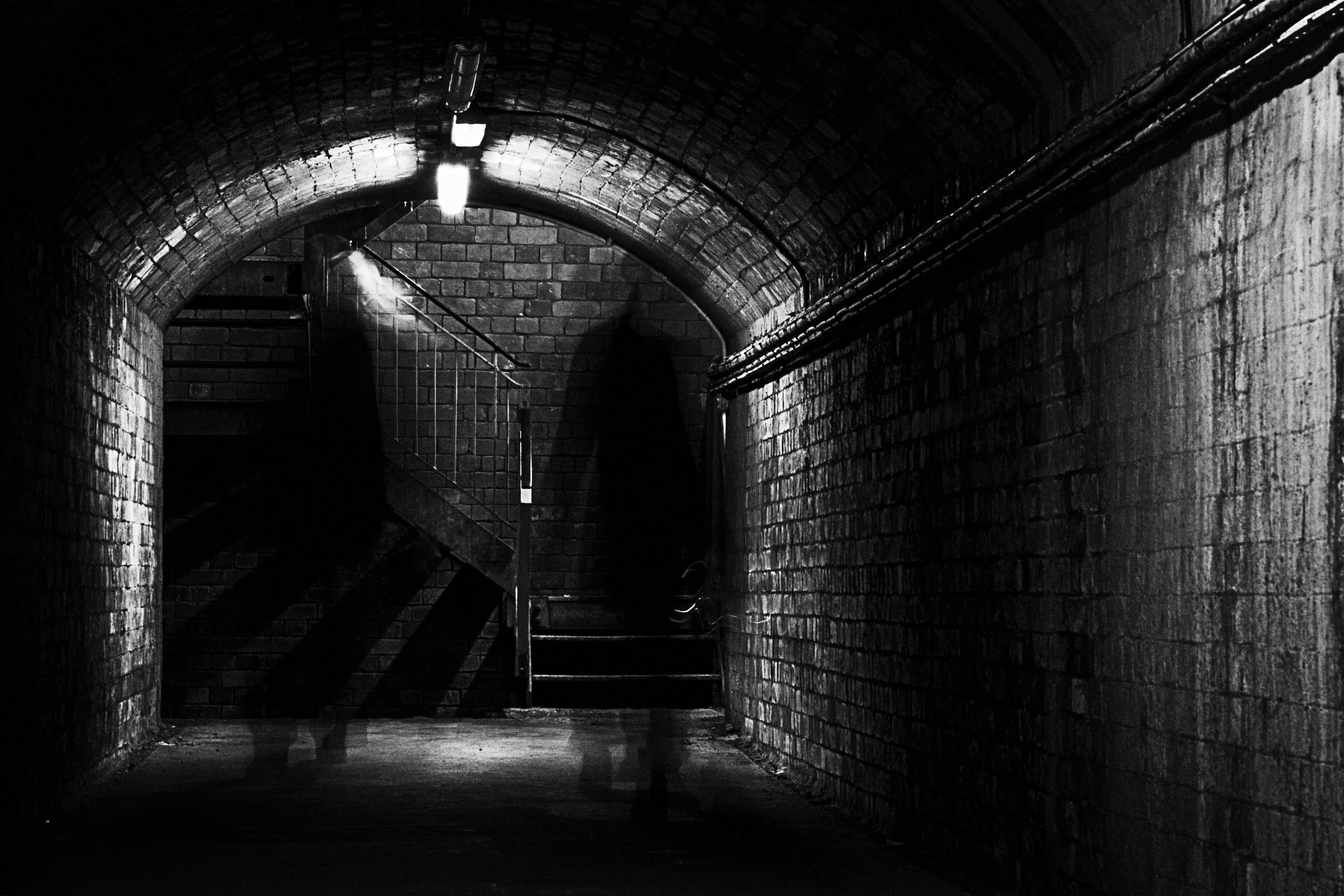 Dark Underground, brick tunnel, shadowy figure, 4K Desktop Wallpaper