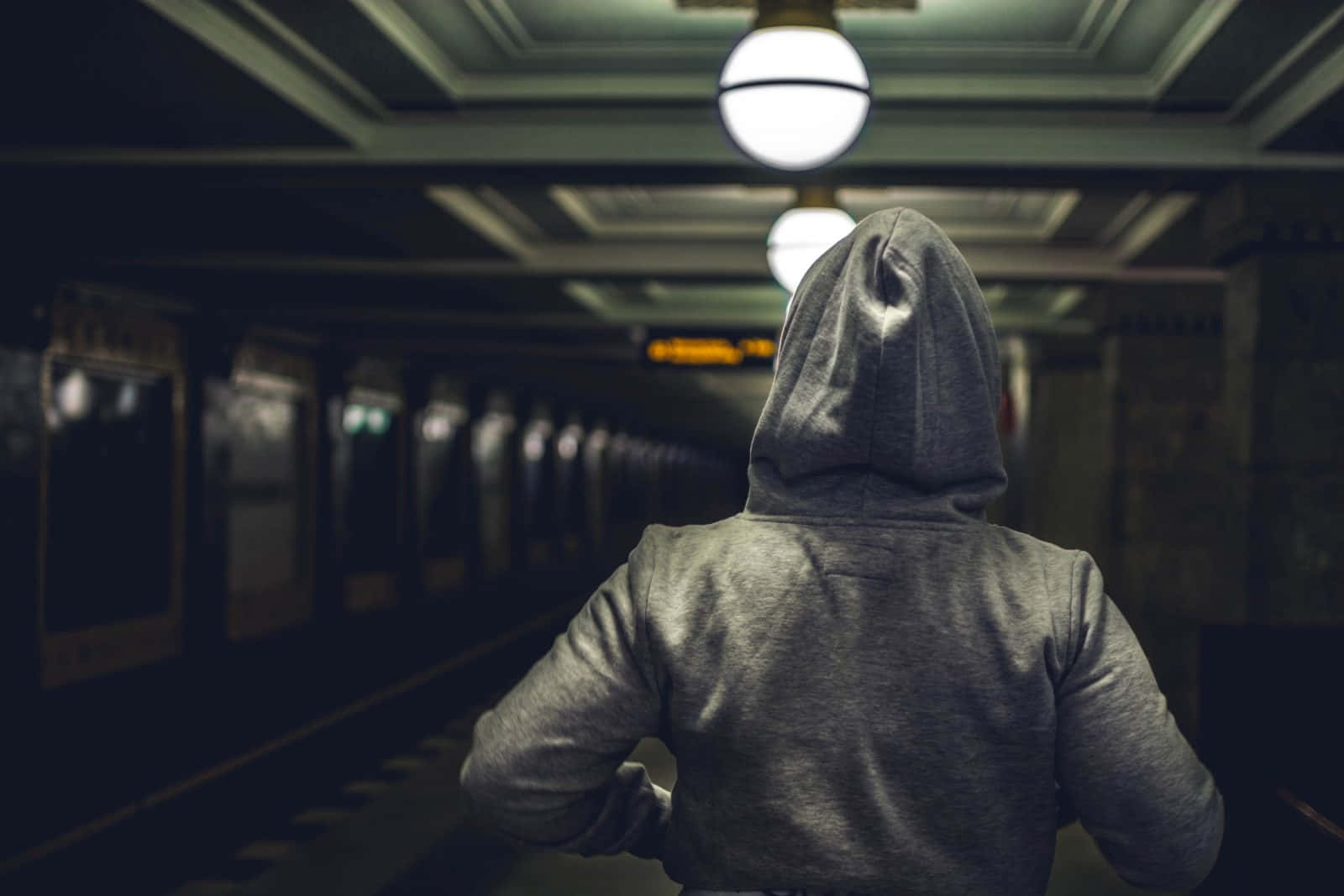 Dark Underground, grey hoodie, dimly lit subway station, HD Desktop Wallpaper