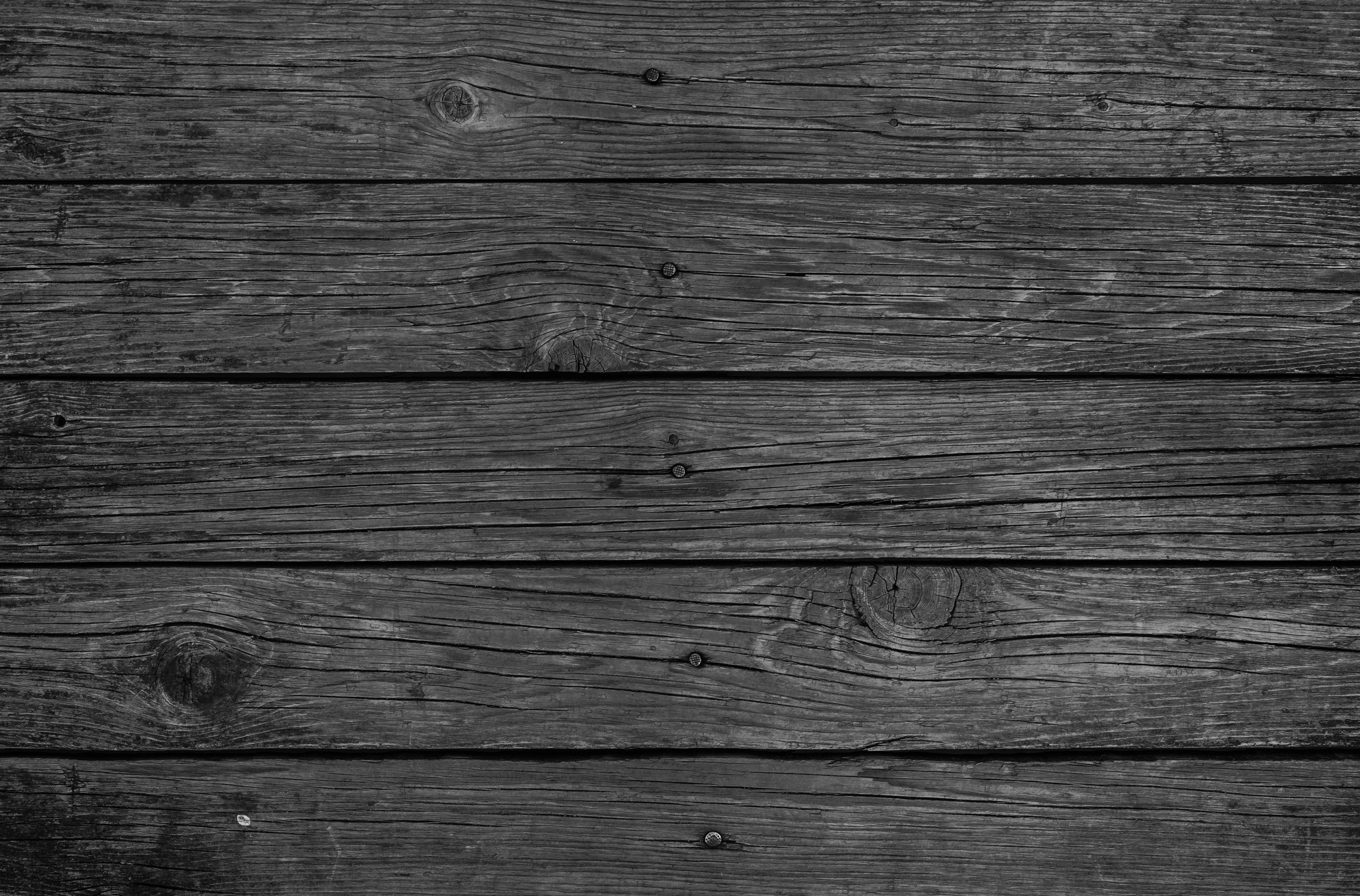 Straight Wooden Dark Wall, weathered dark gray wooden planks, natural grain knots, 2K Desktop Wallpaper