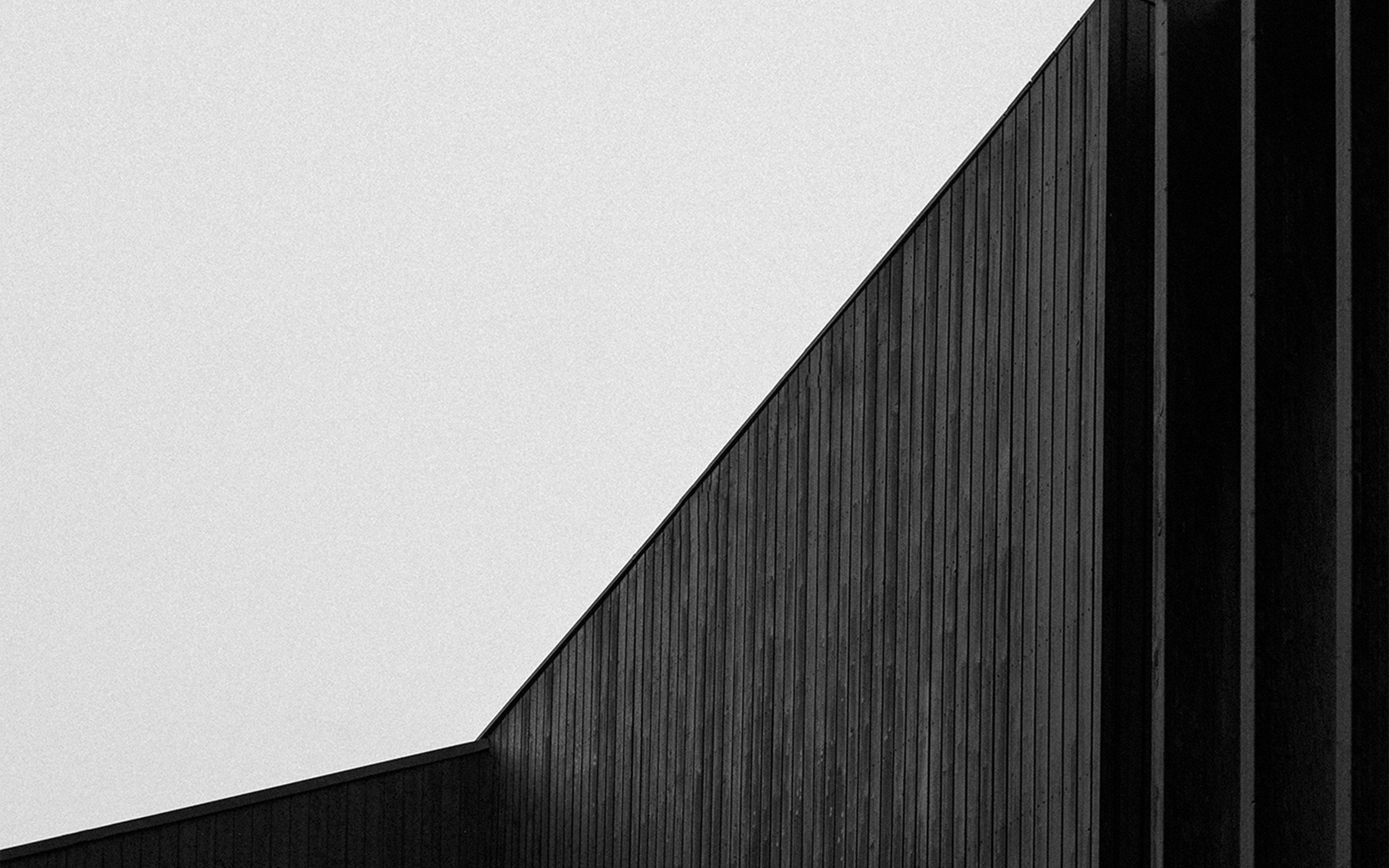 dark wooden slatted wall, pale sky, black and white architectural shot, 4K Desktop Wallpaper