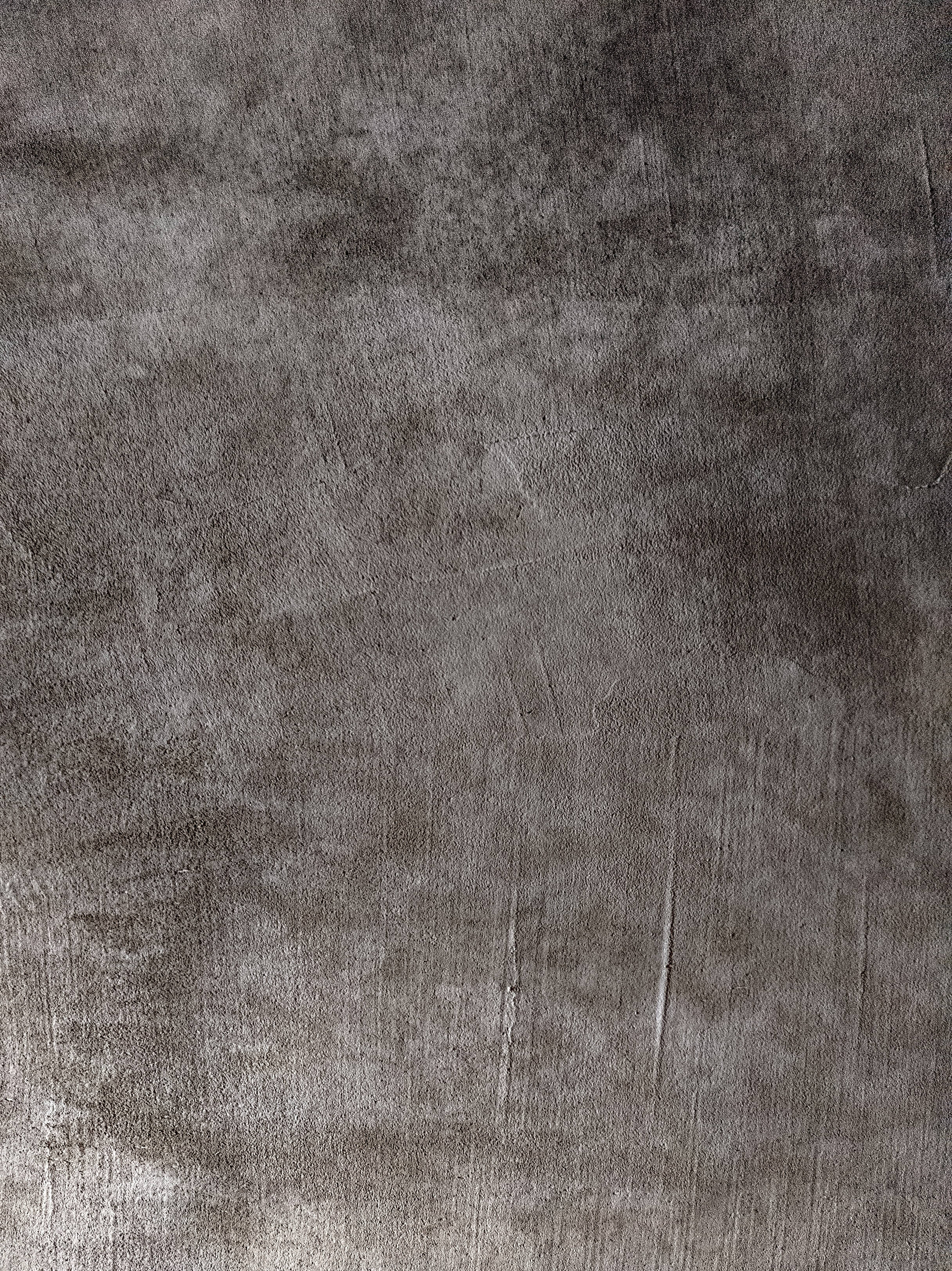 dark industrial concrete wall, textured gray concrete, subtle scratches, 2K Phone Wallpaper
