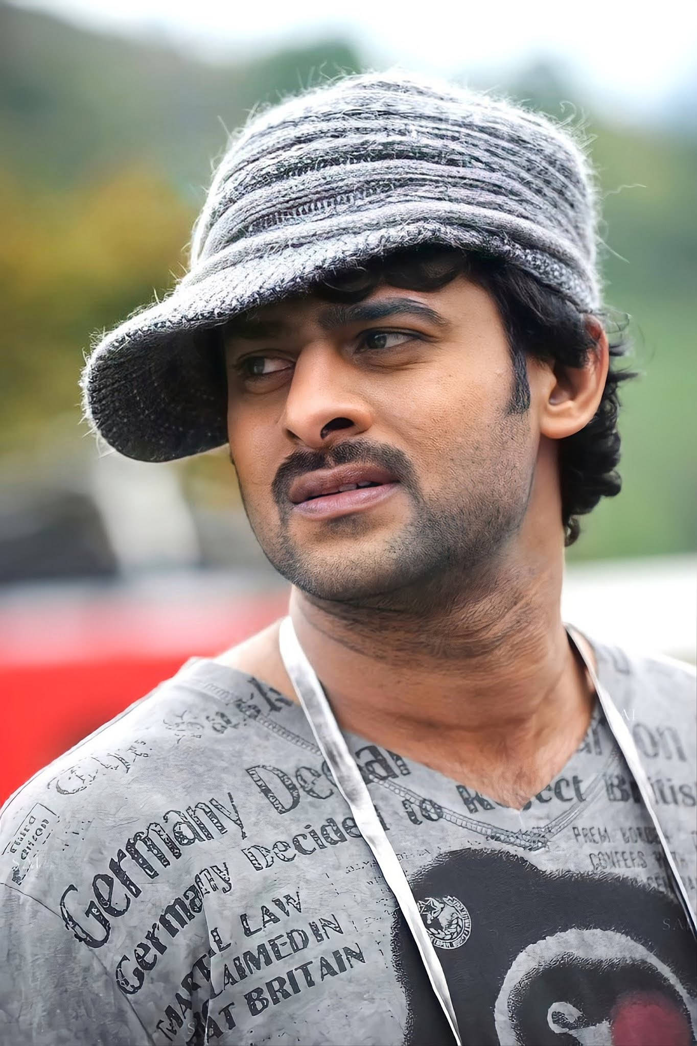 Darling Prabhas Movie, gray knit hat, newspaper-print shirt, Full HD Phone Wallpaper