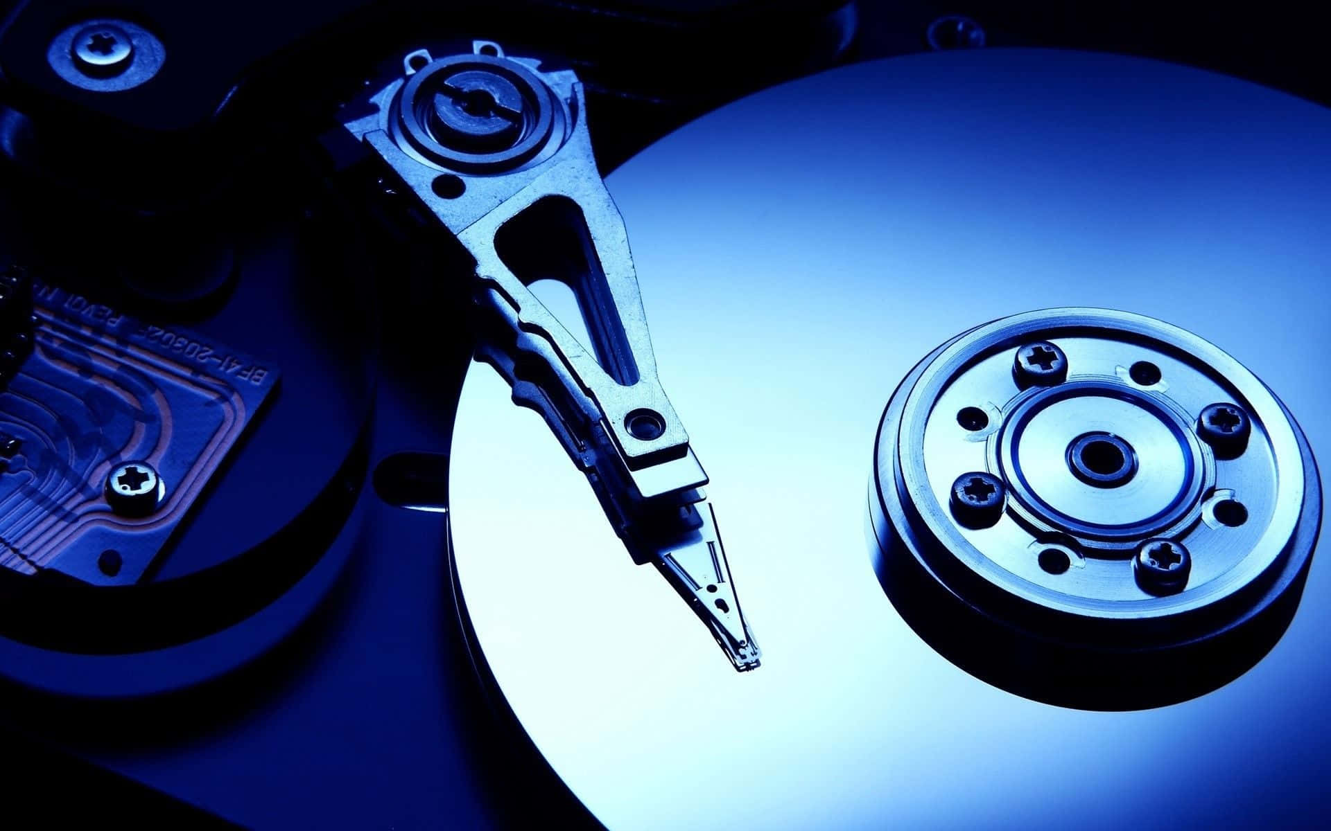 hard drive, spinning platter, read/write head, Full HD Desktop Wallpaper