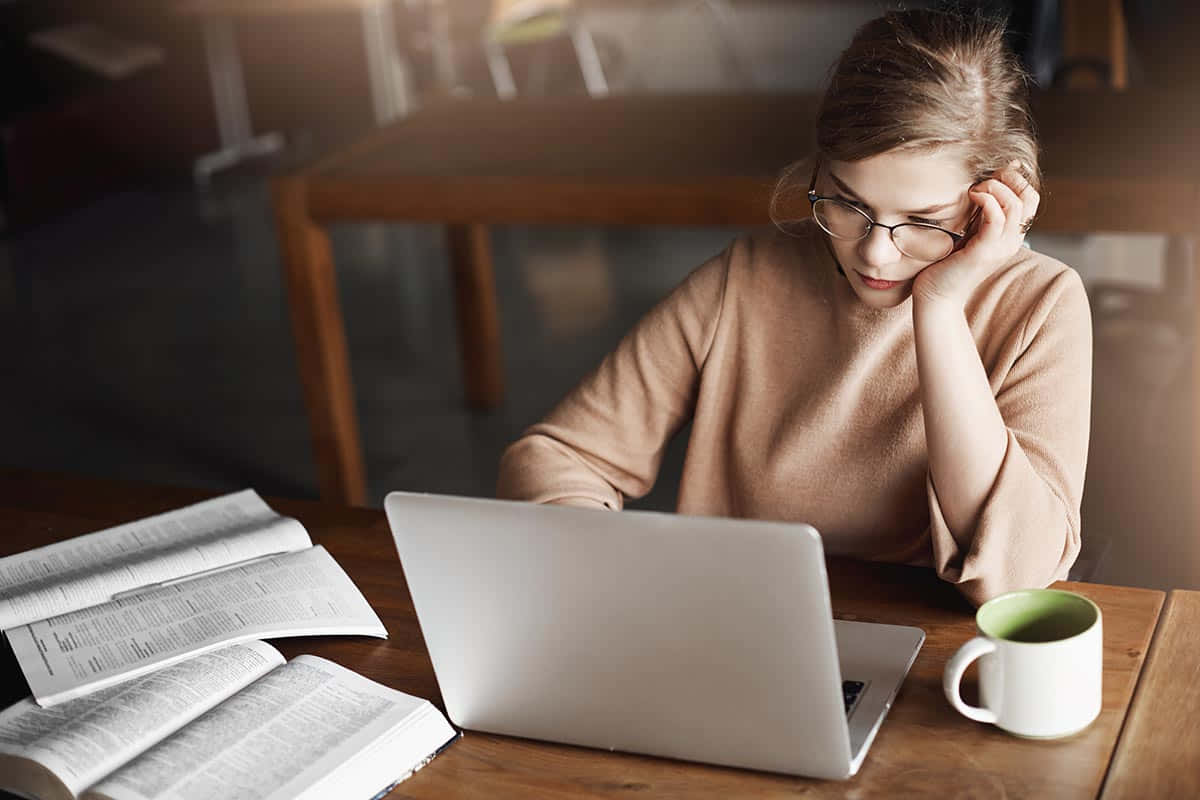 Daunting Work, woman in glasses, wooden desk, SD Desktop Wallpaper