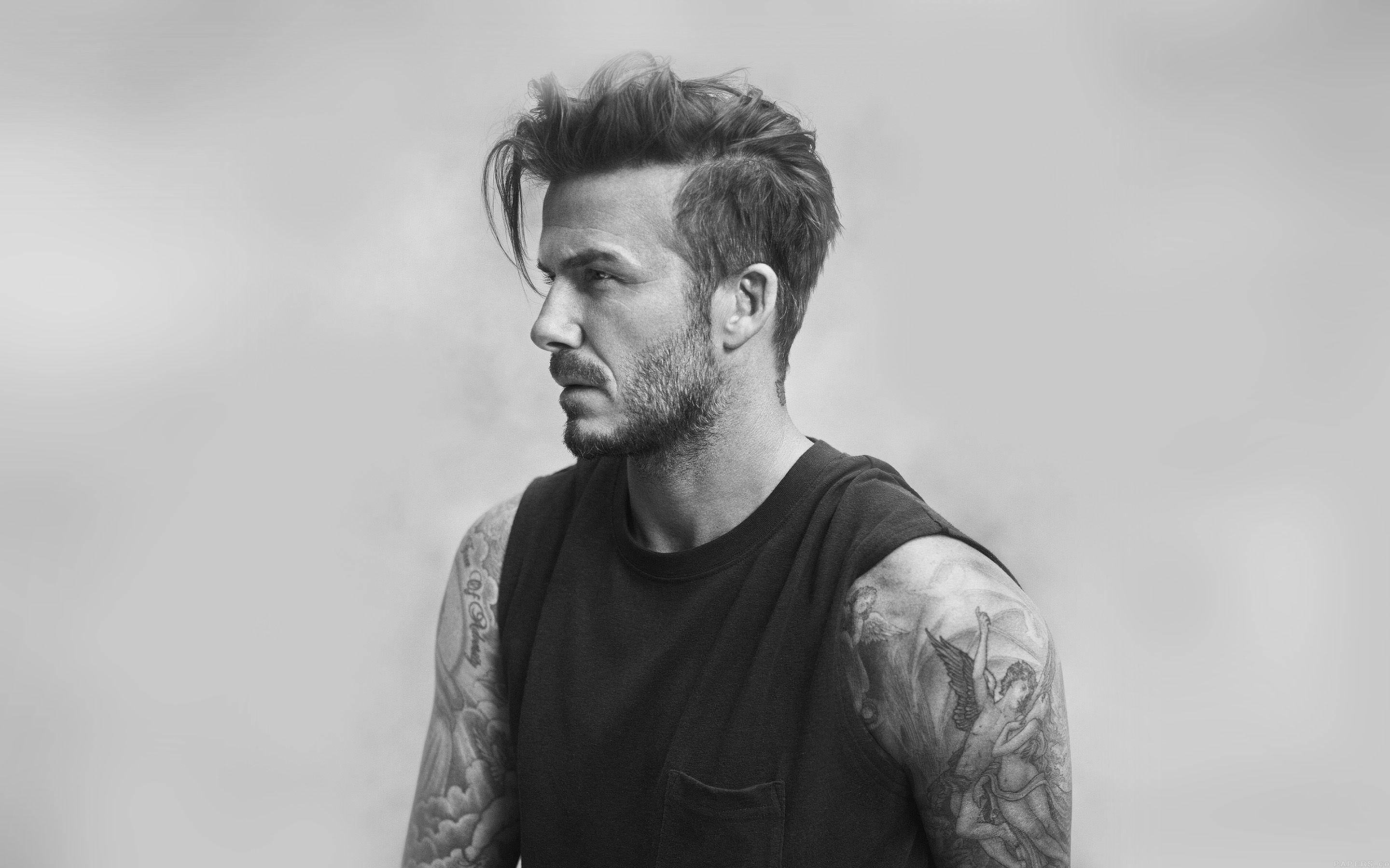 David Beckham, black and white portrait, tattoos on his arms, 2K Desktop Wallpaper