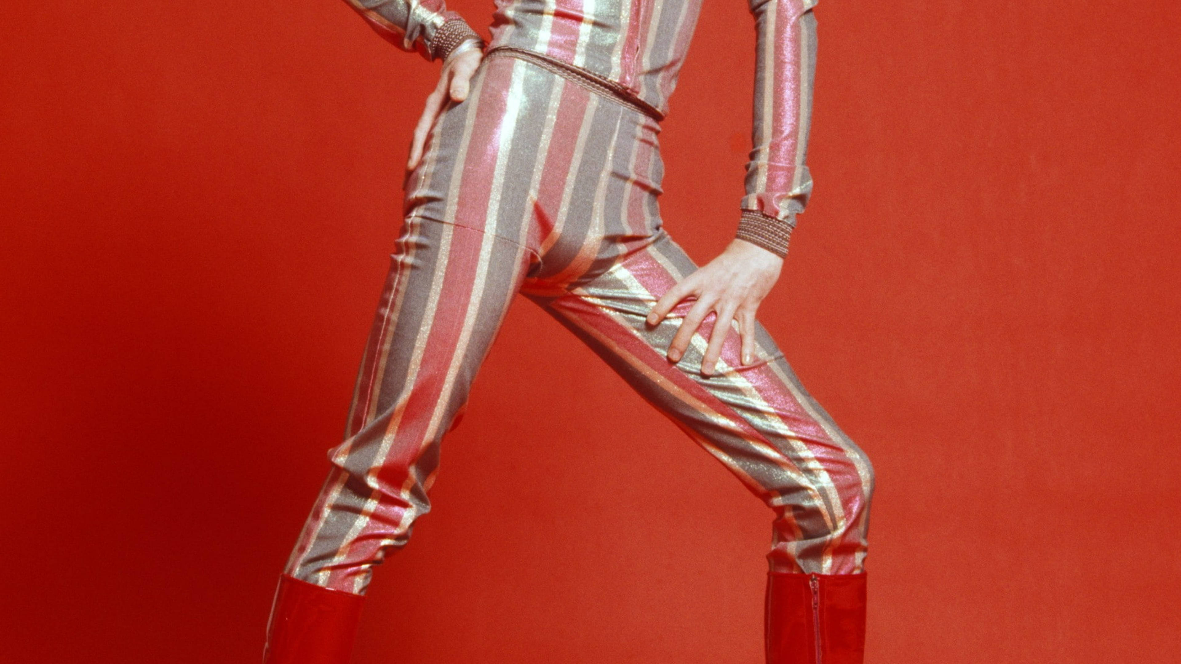 David Bowie, shiny striped jumpsuit, bold red background, 4K Desktop Wallpaper