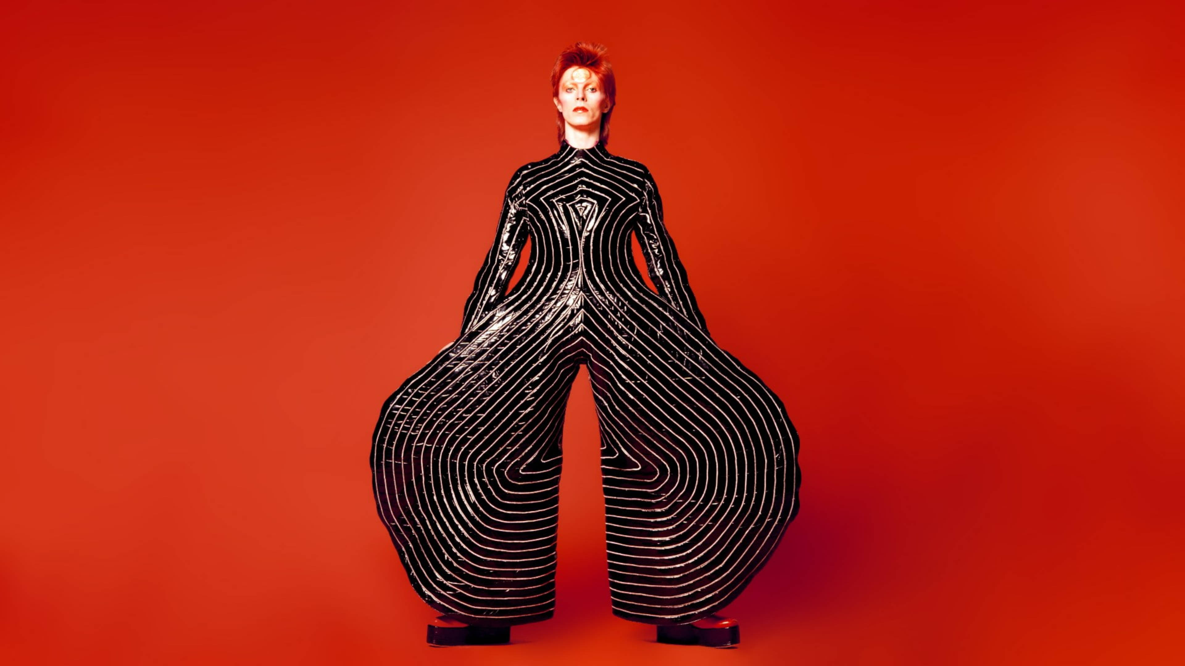 David Bowie, red hair, black and white striped futuristic gown, 4K Desktop Wallpaper