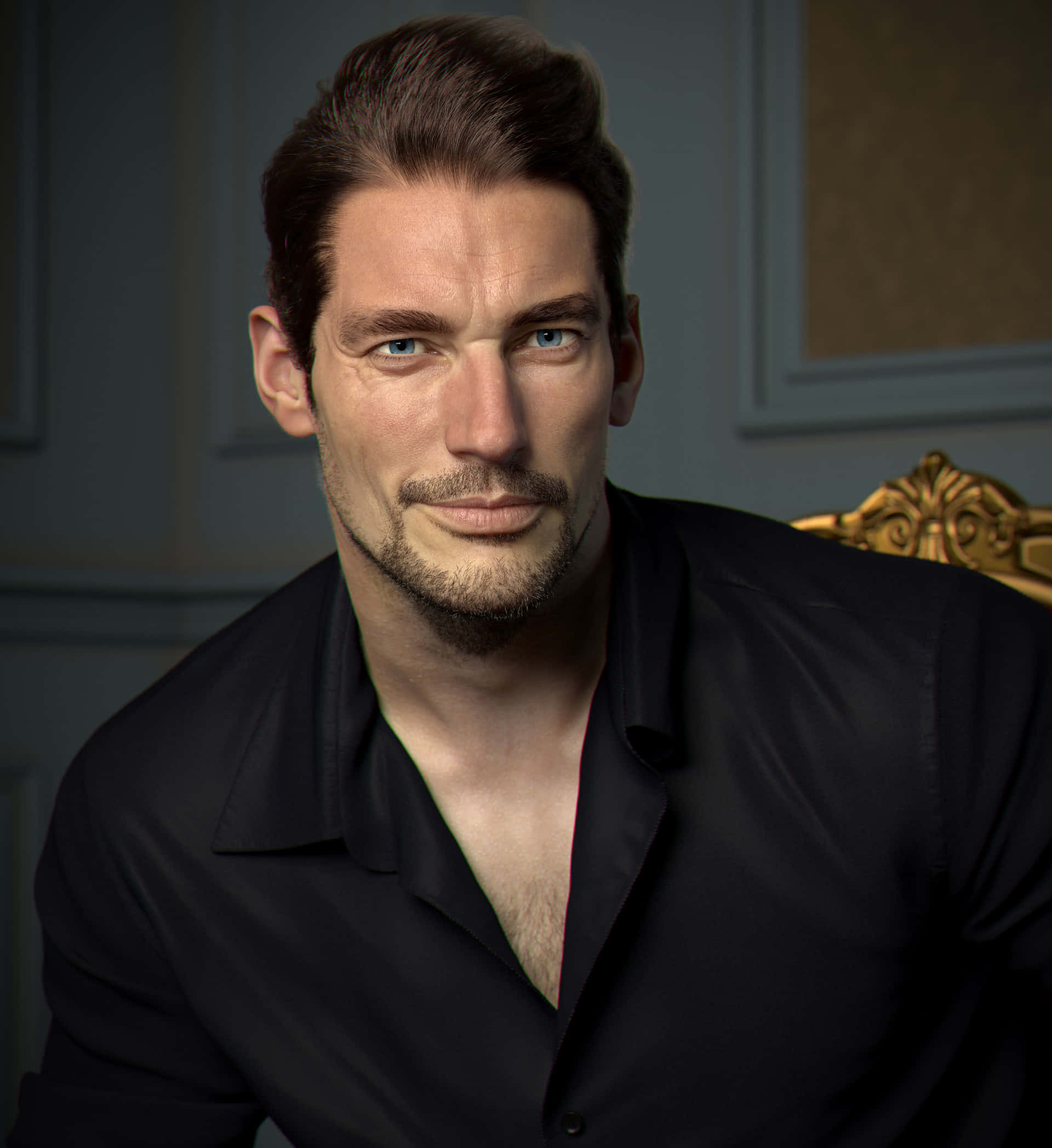 David Gandy, golden chair, muted gray wall, Full HD Phone Wallpaper