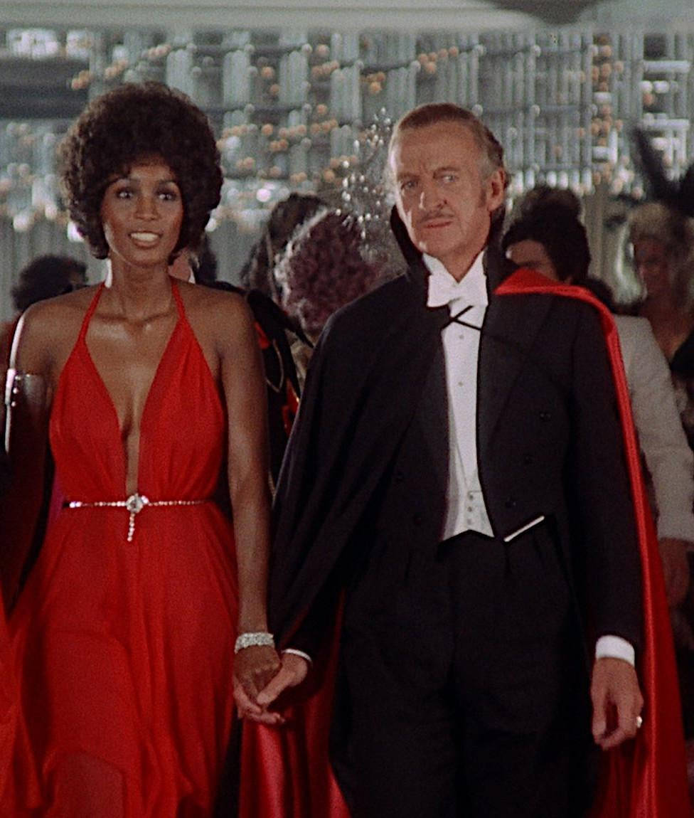 1974 Vampira Film, David Niven, glittering ballroom, SD Phone Wallpaper