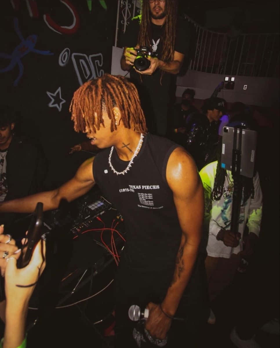 Dc The Don, orange dreadlocks, dimly lit party, SD Phone Wallpaper