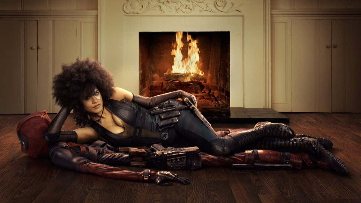 Deadpool and Domino, red-suited figure, large afro, SD Desktop Wallpaper