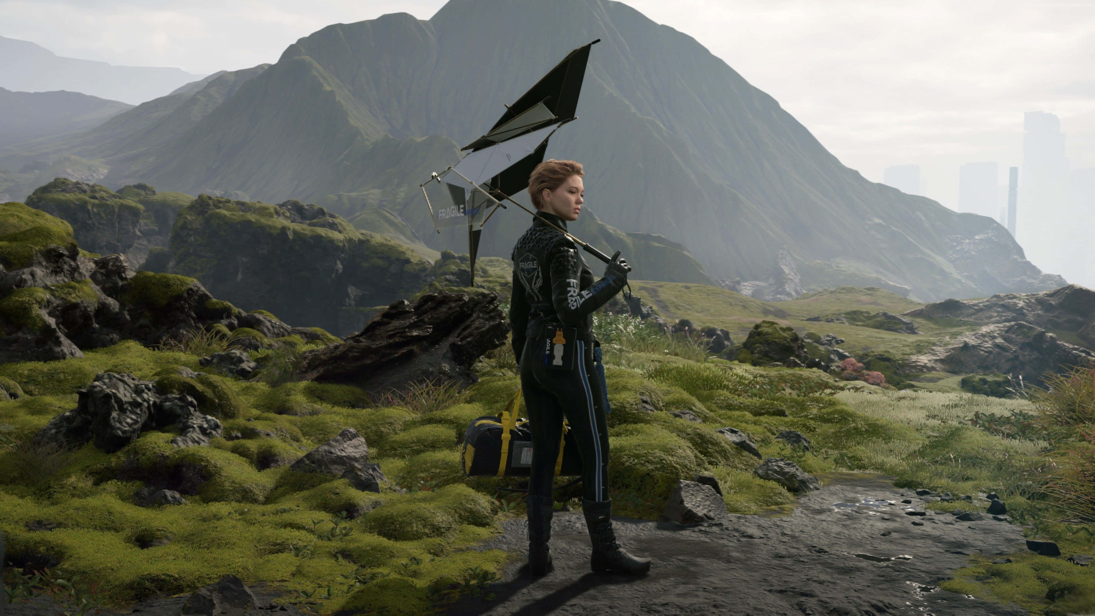 Death Stranding, black flight suit, mossy mountain ridge, 4K Desktop Wallpaper