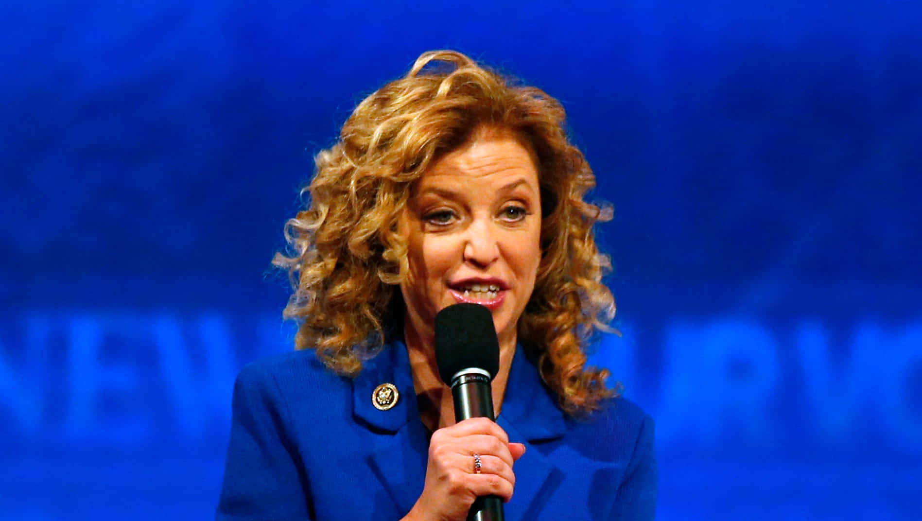 Debbie Wasserman Schultz, curly blonde hair, microphone, HD Desktop Wallpaper