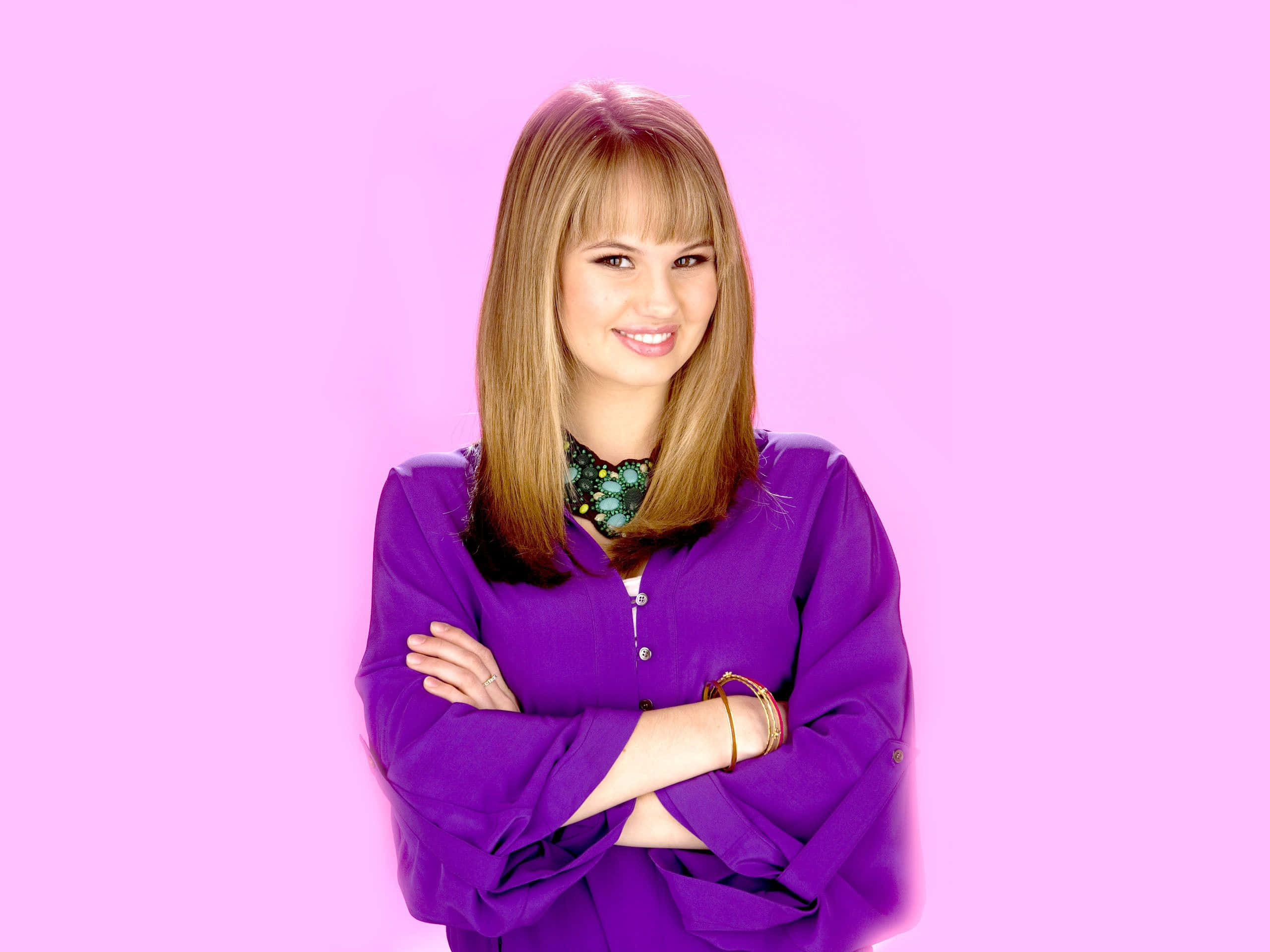 Debby Ryan, blonde hair, purple blouse, 2K Desktop Wallpaper