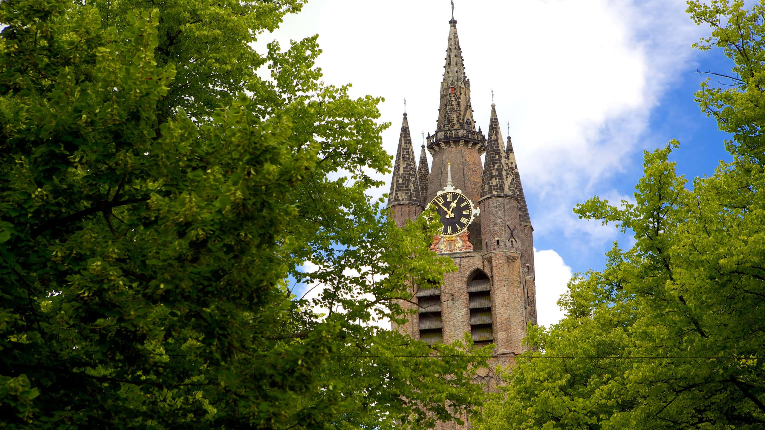 Delft, historic church tower clock, stone church tower, 2K Desktop Wallpaper