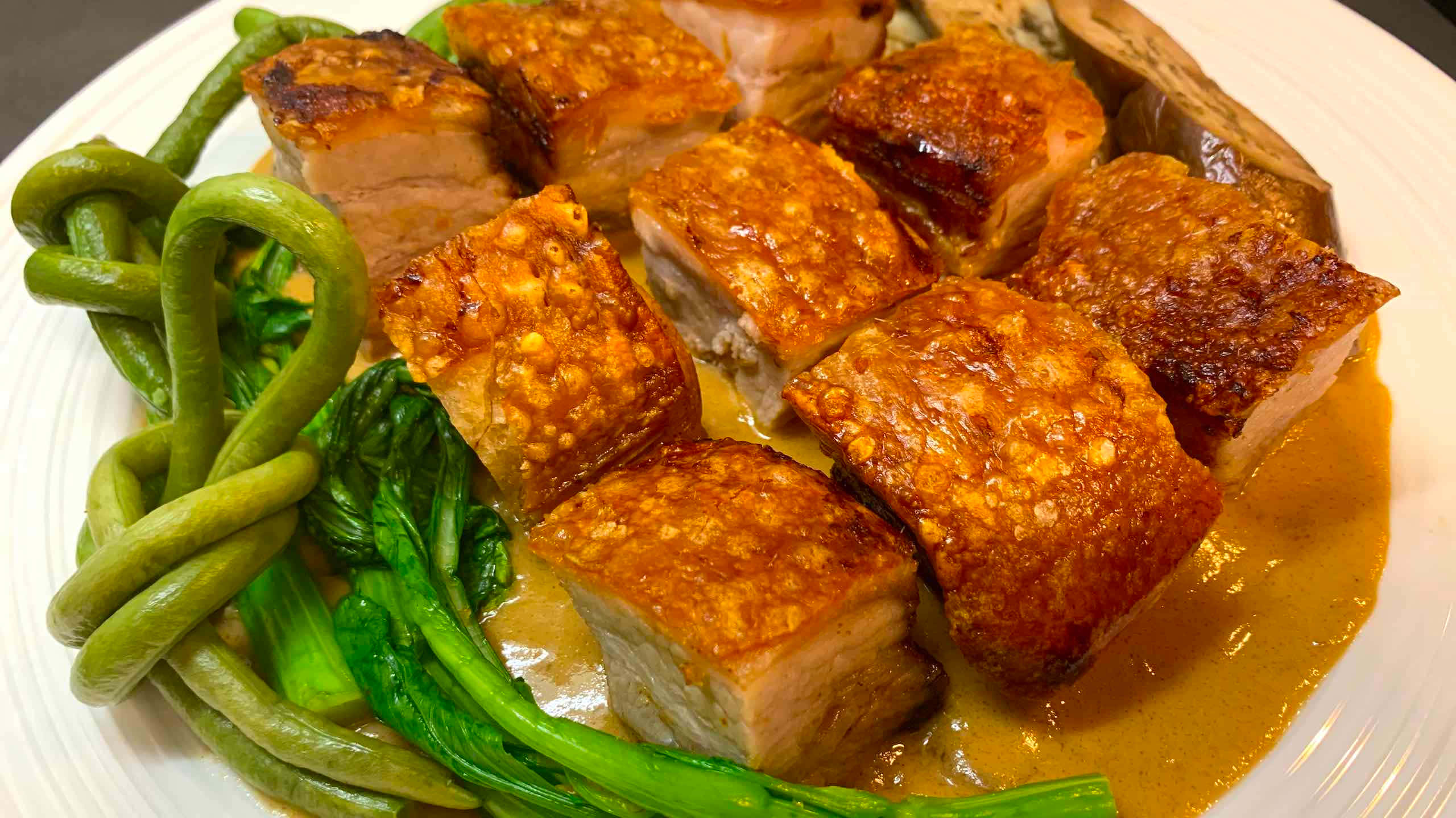 deep fried pork belly cuts, kare kare, crispy golden-brown pork belly cubes, 2K Desktop Wallpaper