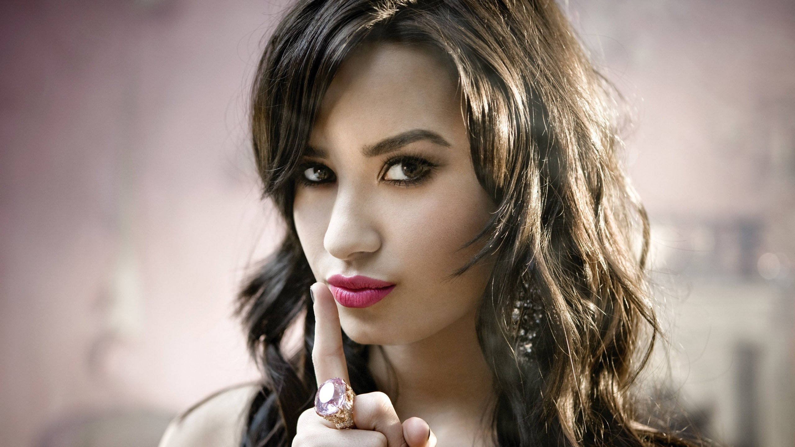 Demi Lovato, silence hand gesture, dark wavy hair, 2K Desktop Wallpaper