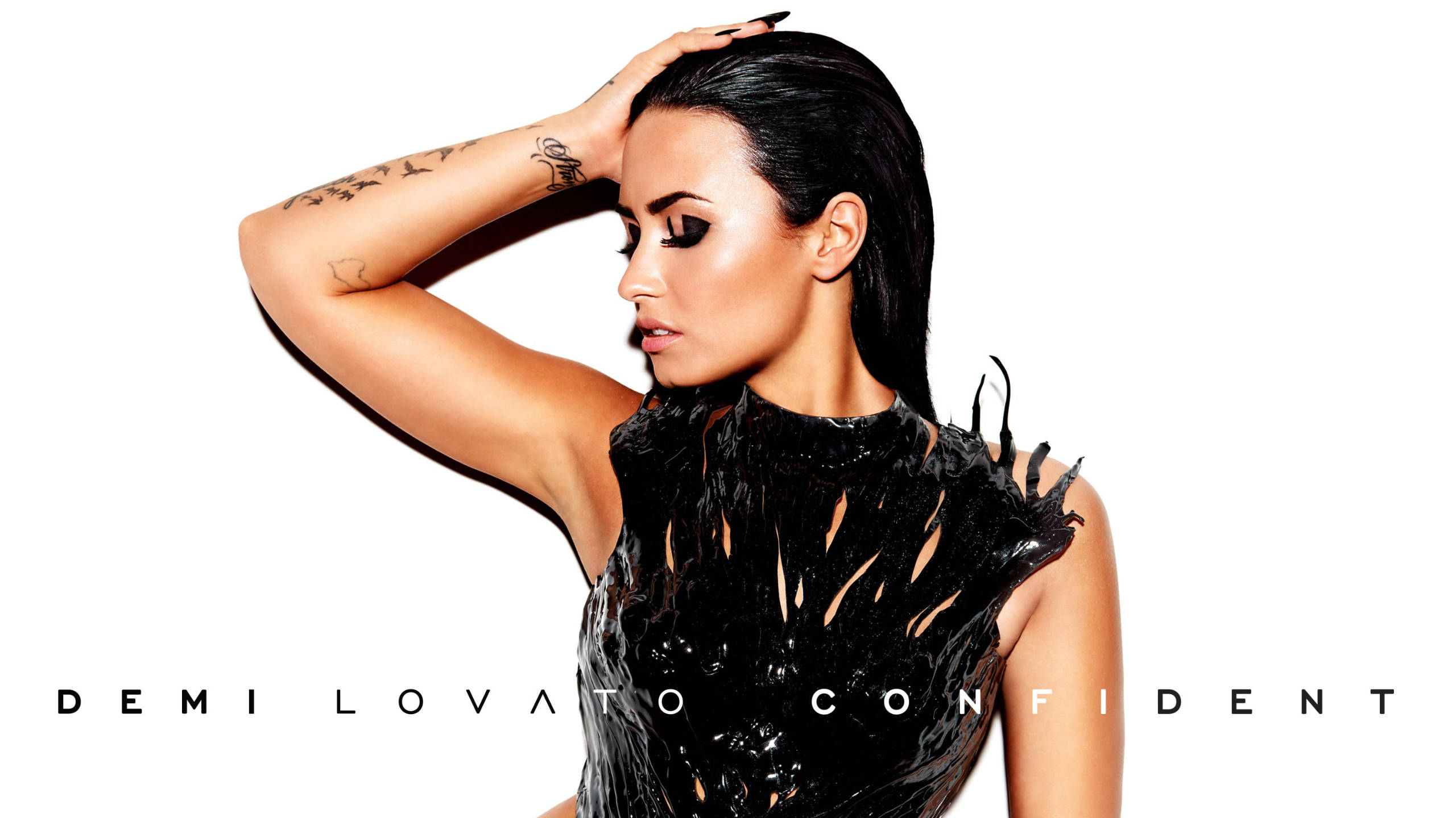 Demi Lovato, glossy black outfit, stark white background, 2K Desktop Wallpaper