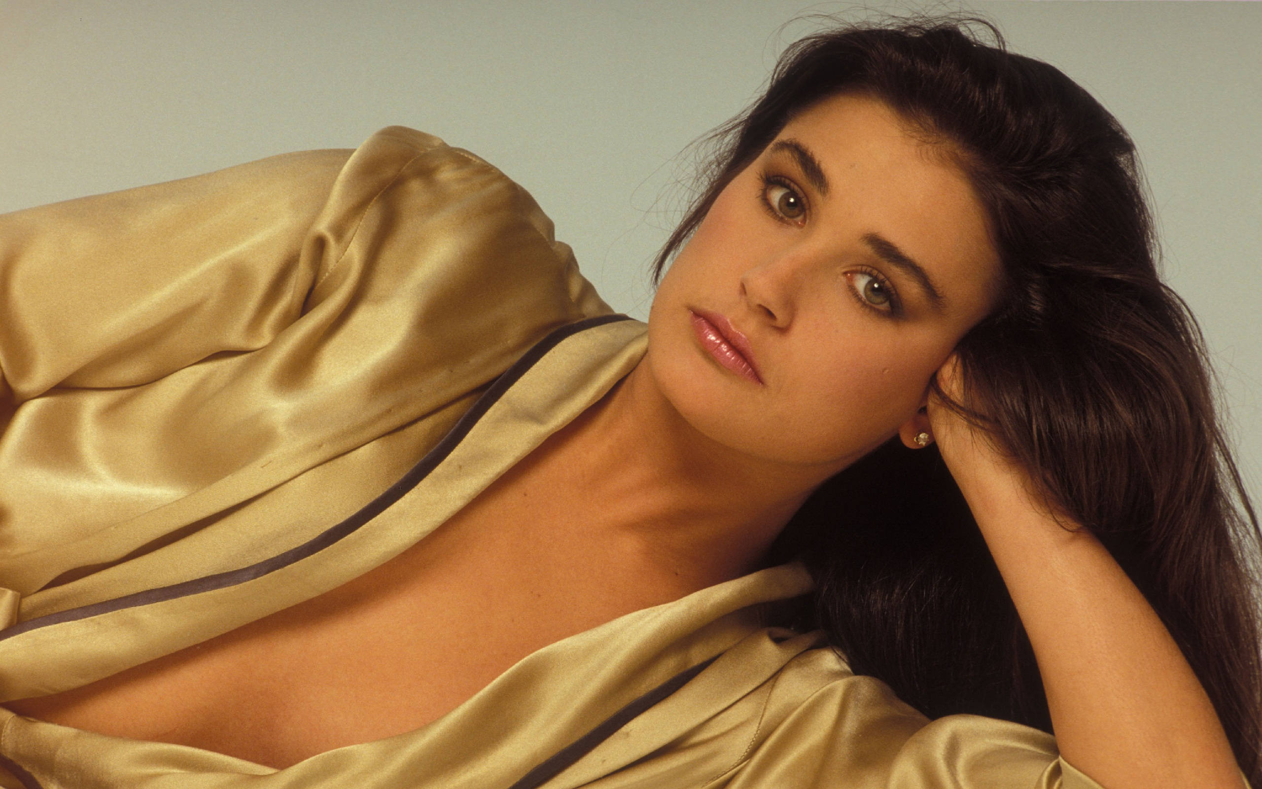 Demi Moore, gold satin robe, dark hair, 2K Desktop Wallpaper