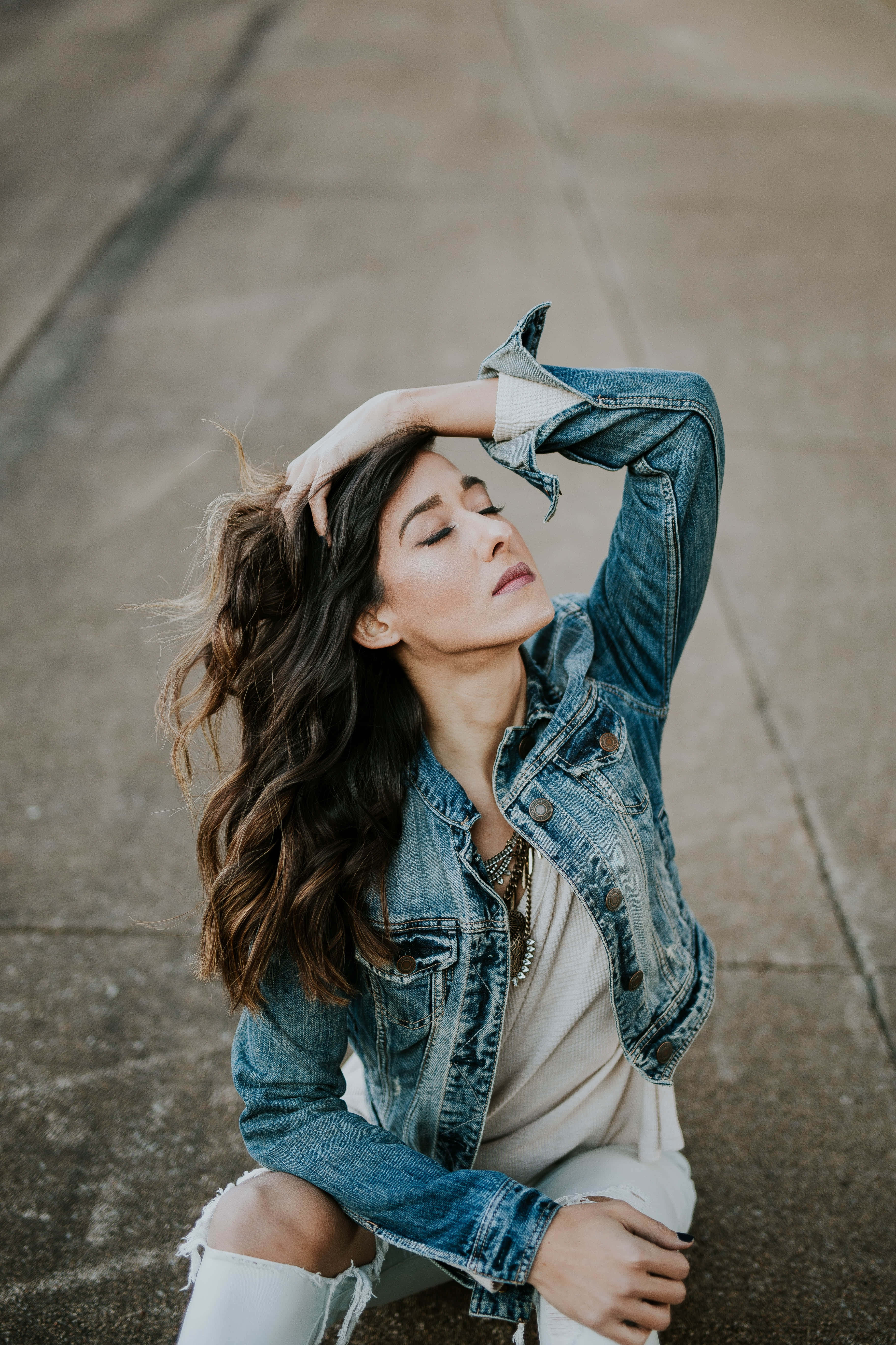 denim jacket, pavement, soft natural light, 5K Phone Wallpaper